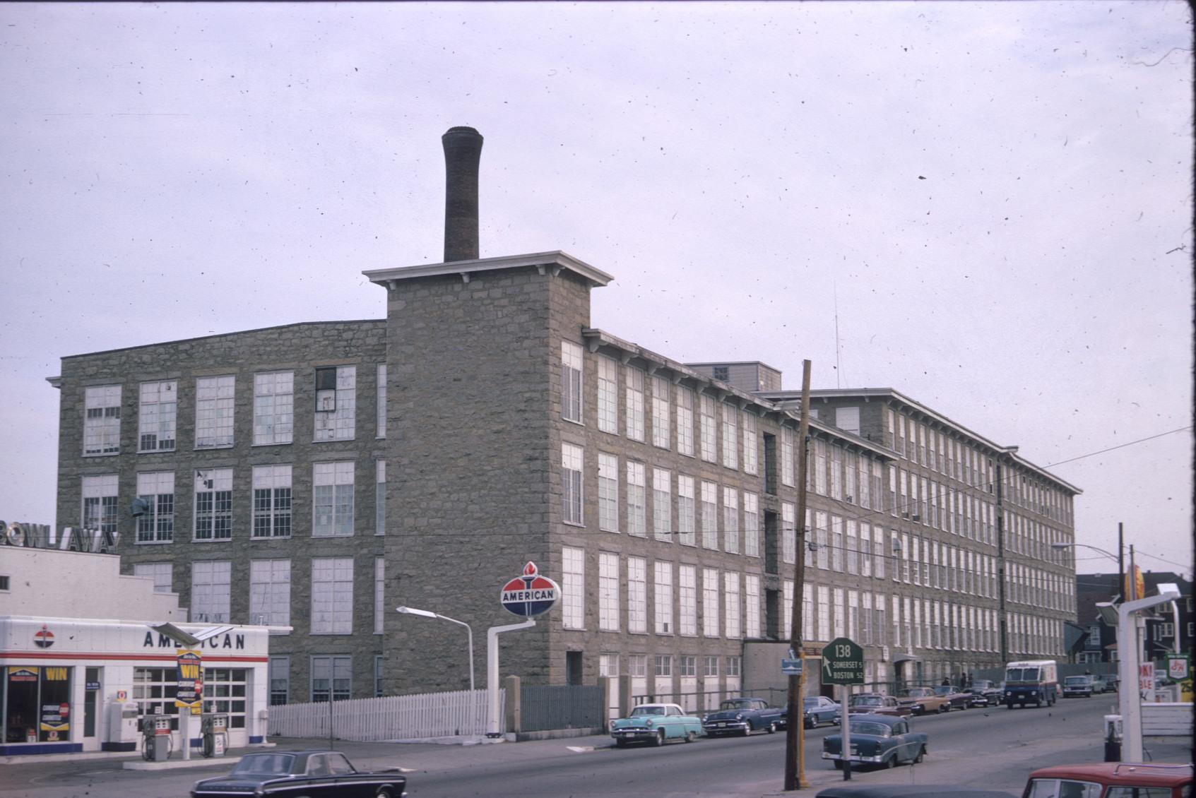 Side view of Laurel Lake Mills.  Large stack visible.