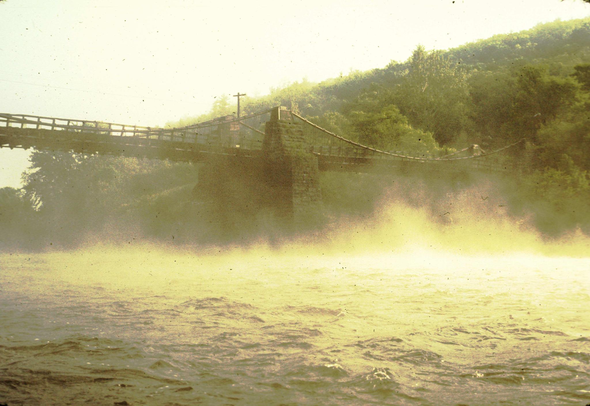 Photograph of Delaware Aqueduct in the mist.The aqueduct was constructed on…