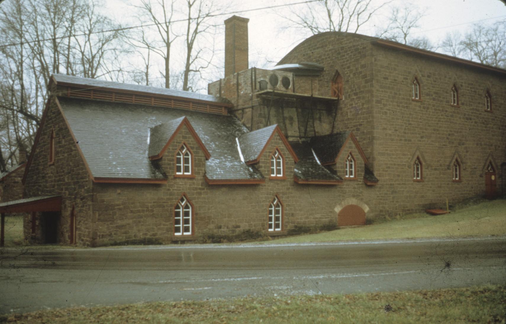 Originally, several distinct buildings clustered around the furnace stack. The…