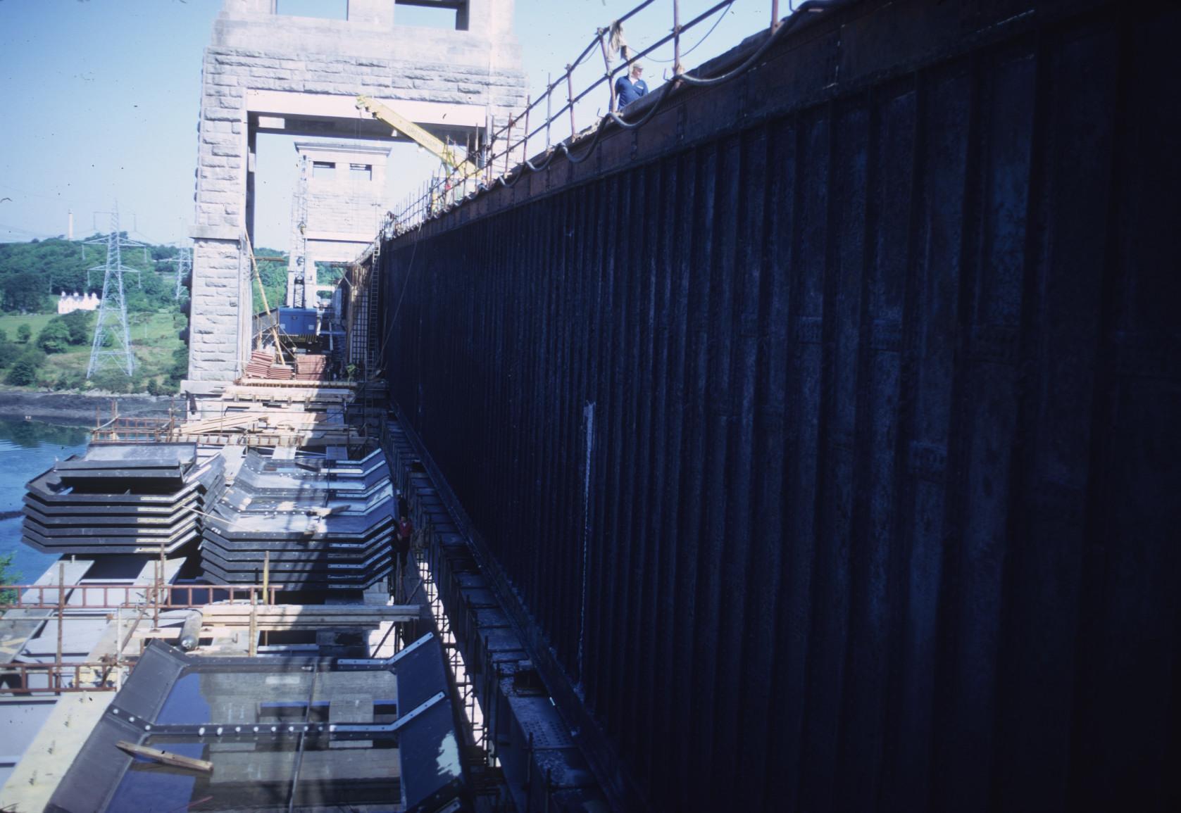 View of structural elements stacked on adjacent tube base