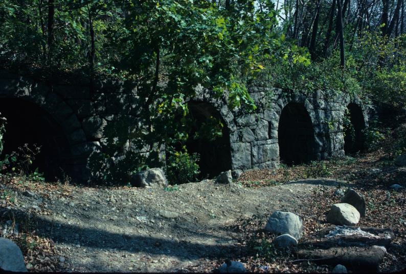 Slide notes: \"Mysterious vaults under line of railway.\"