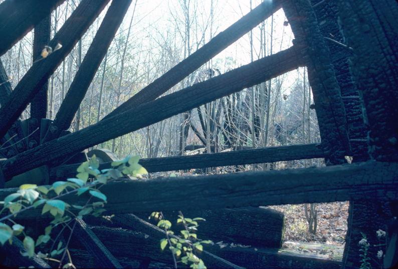 Side frames and shaft, remnant of water wheel to power charcoal furnace blowing…