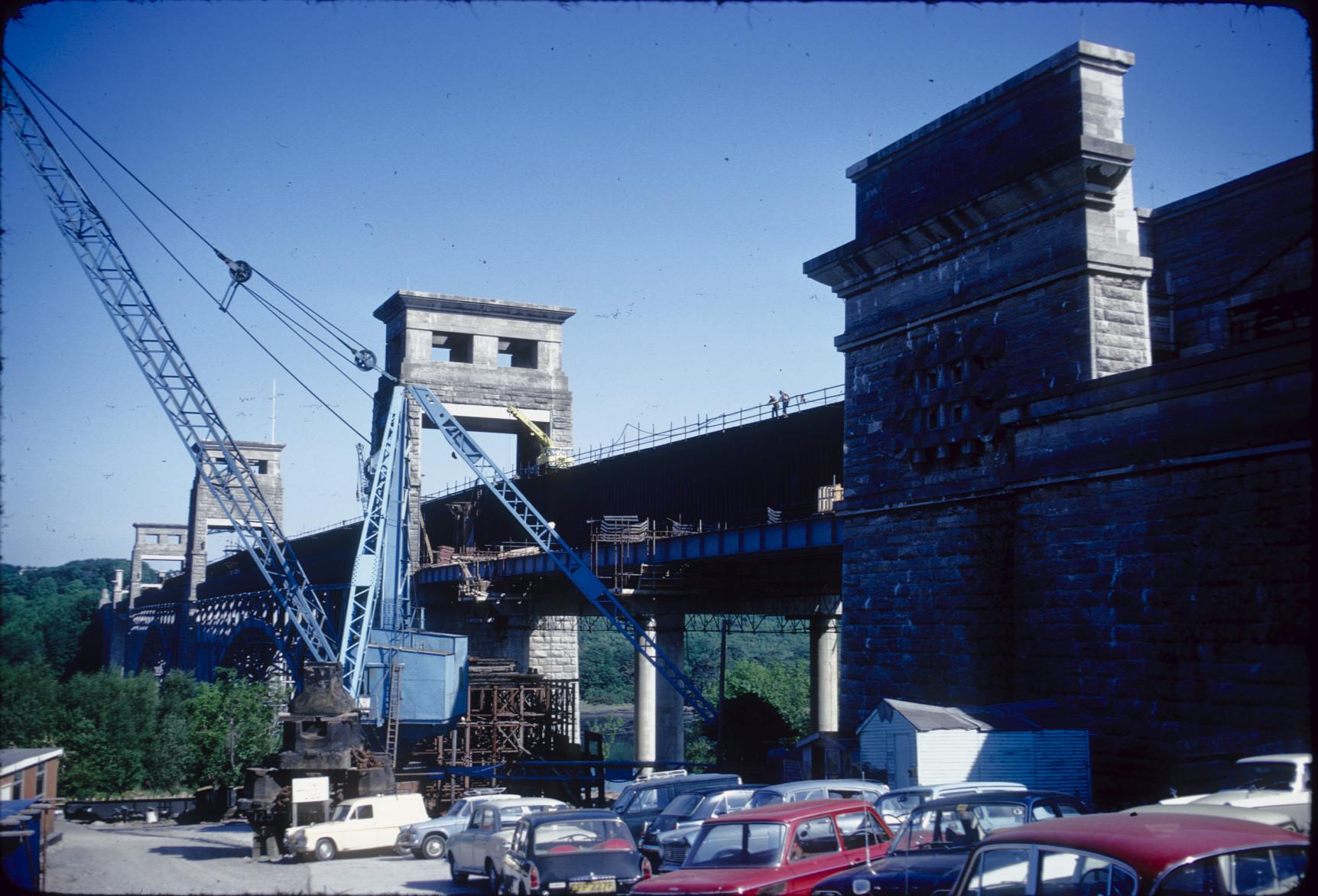 View from ground showing portals, tube and arch spanSecond tube damaged by…