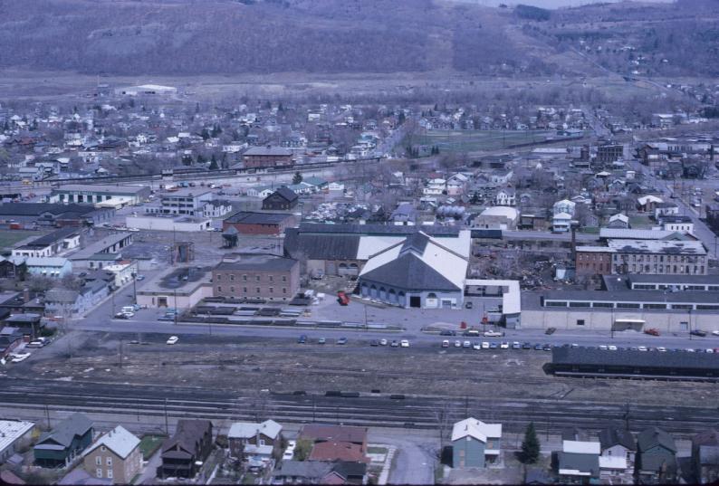 View of mill building and extensive surrounding area, taken from a helicopter.