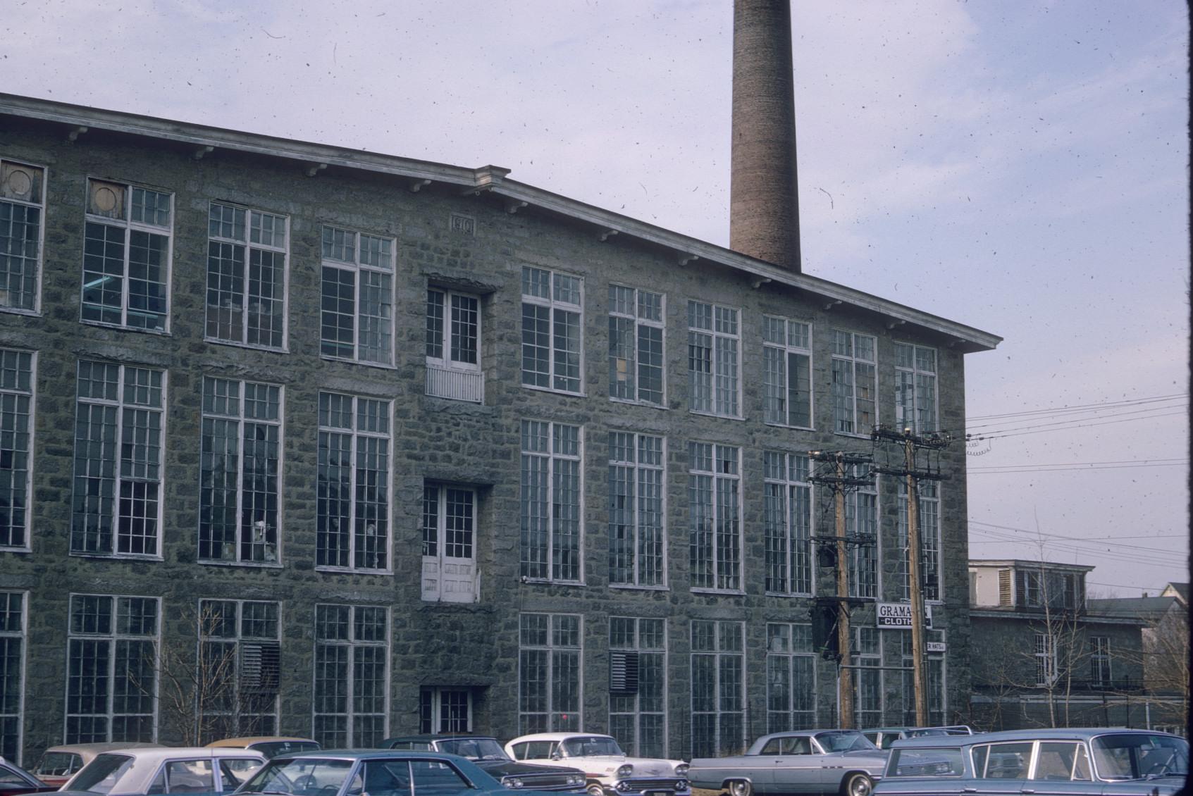 View of the front of the Charlton Mill in Fall River, MA.  Note the large…