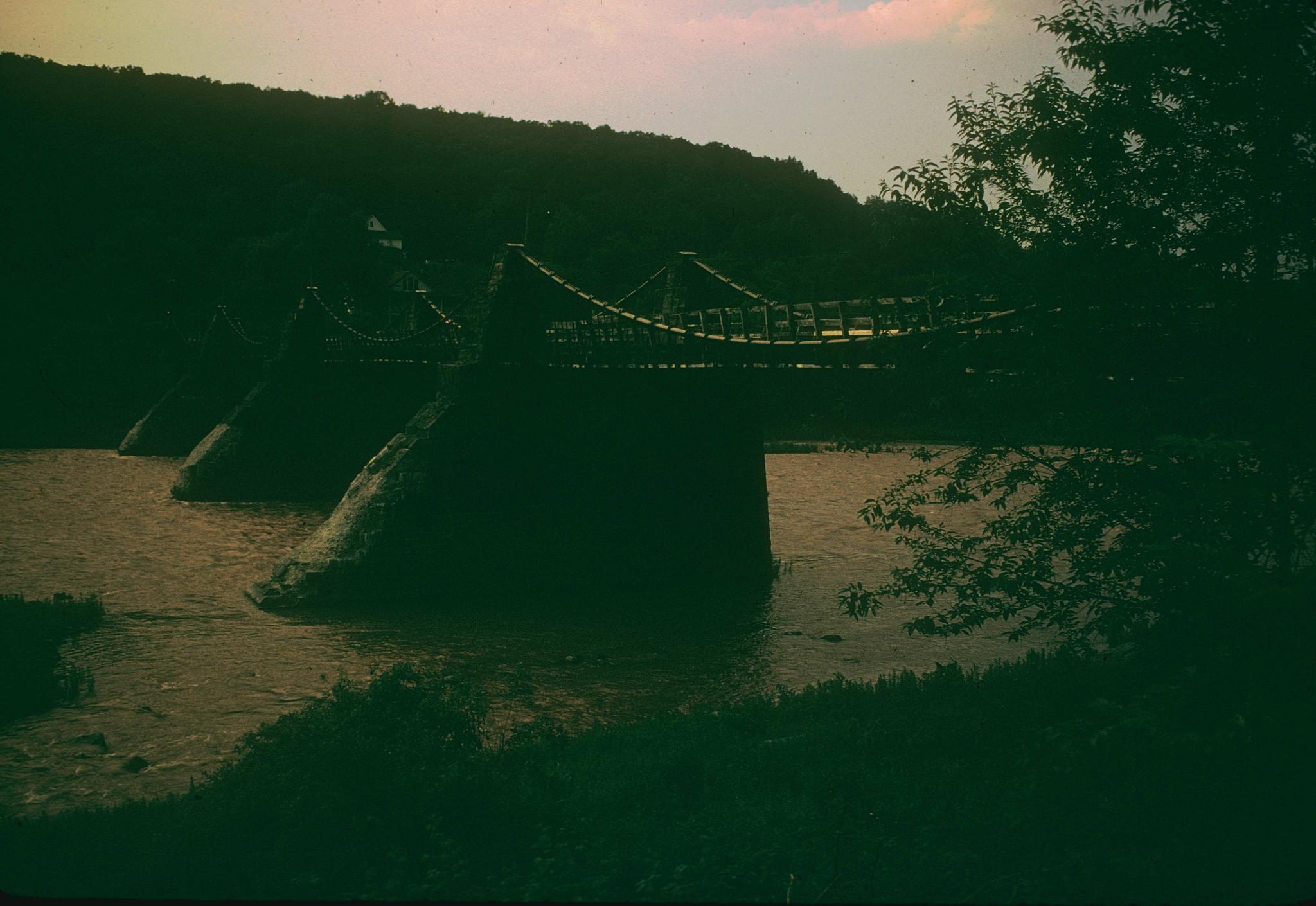 Three-quarter view of Delaware Aqueduct at dusk.The aqueduct was…