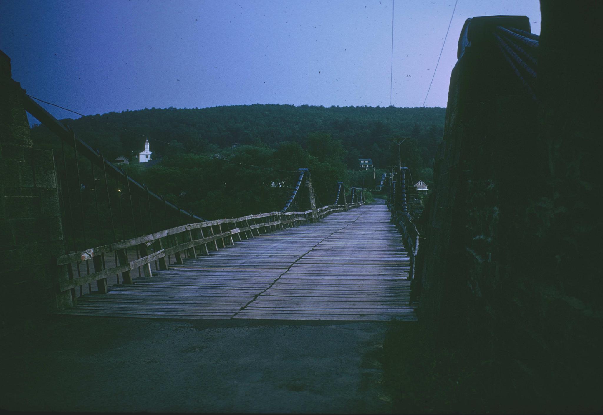 Through view of the deck of the Delaware Aqueduct at dusk.The aqueduct was…