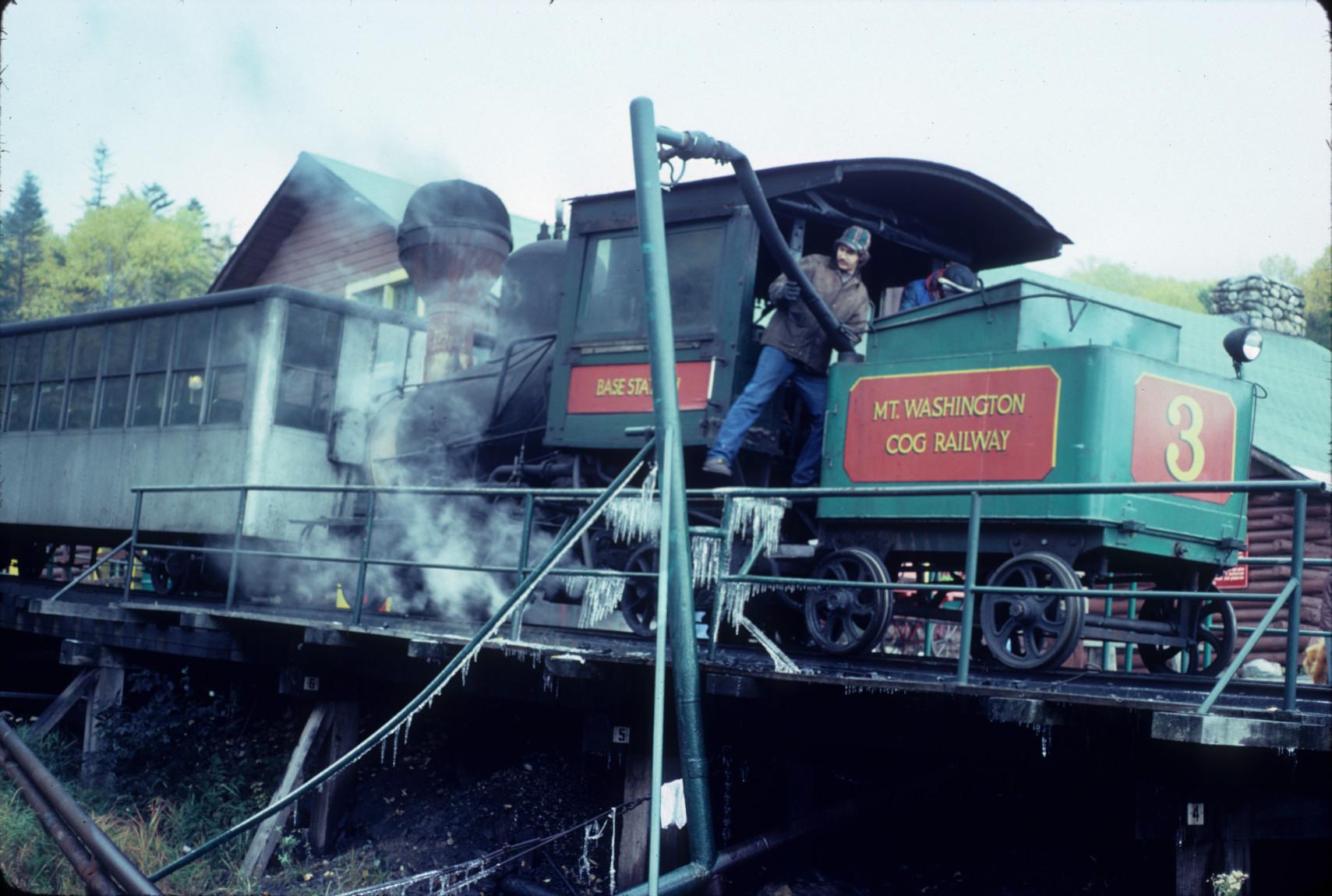 Steam engine number 3 taking on water at Base station