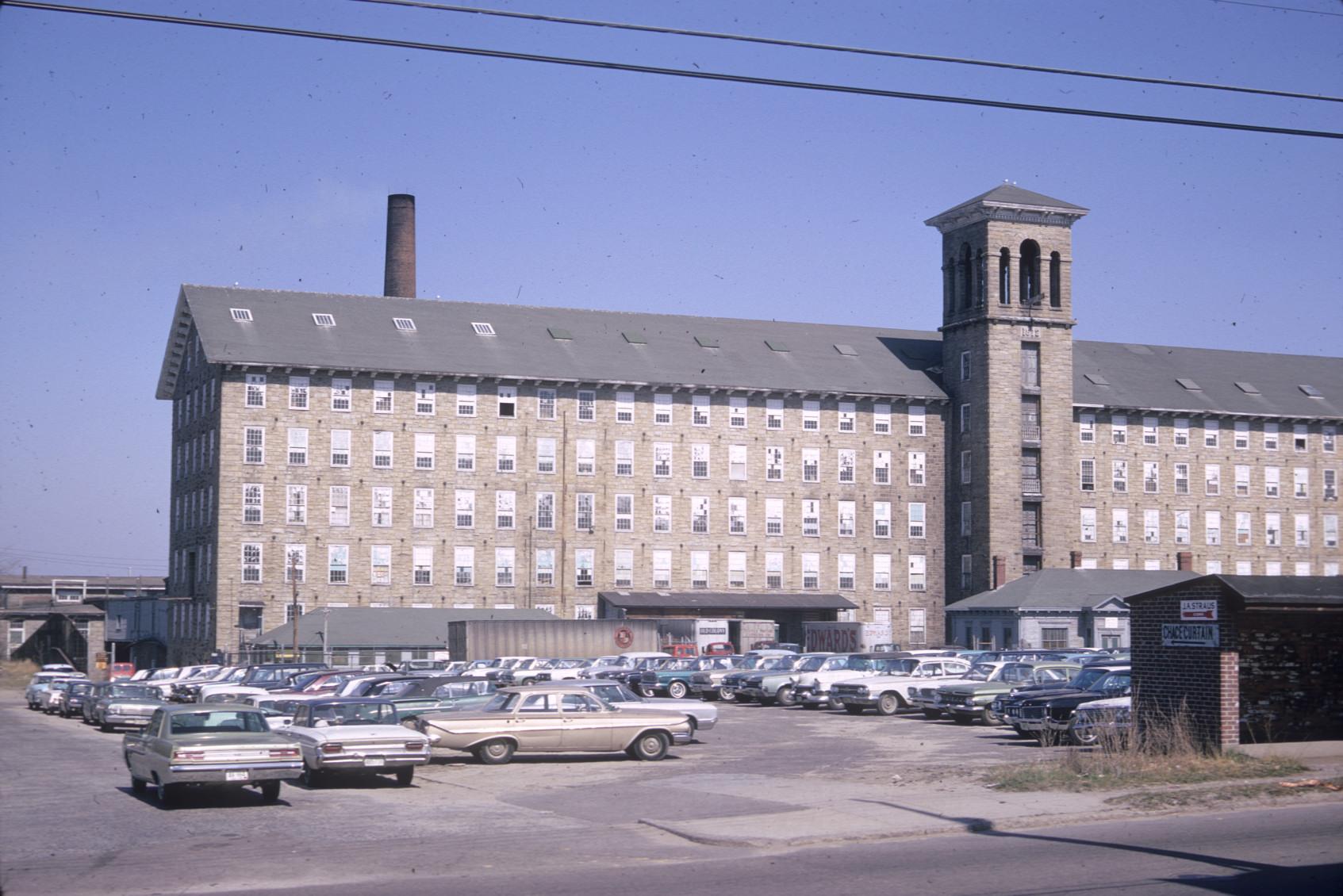 View of stack and bell tower of Chase Mill.