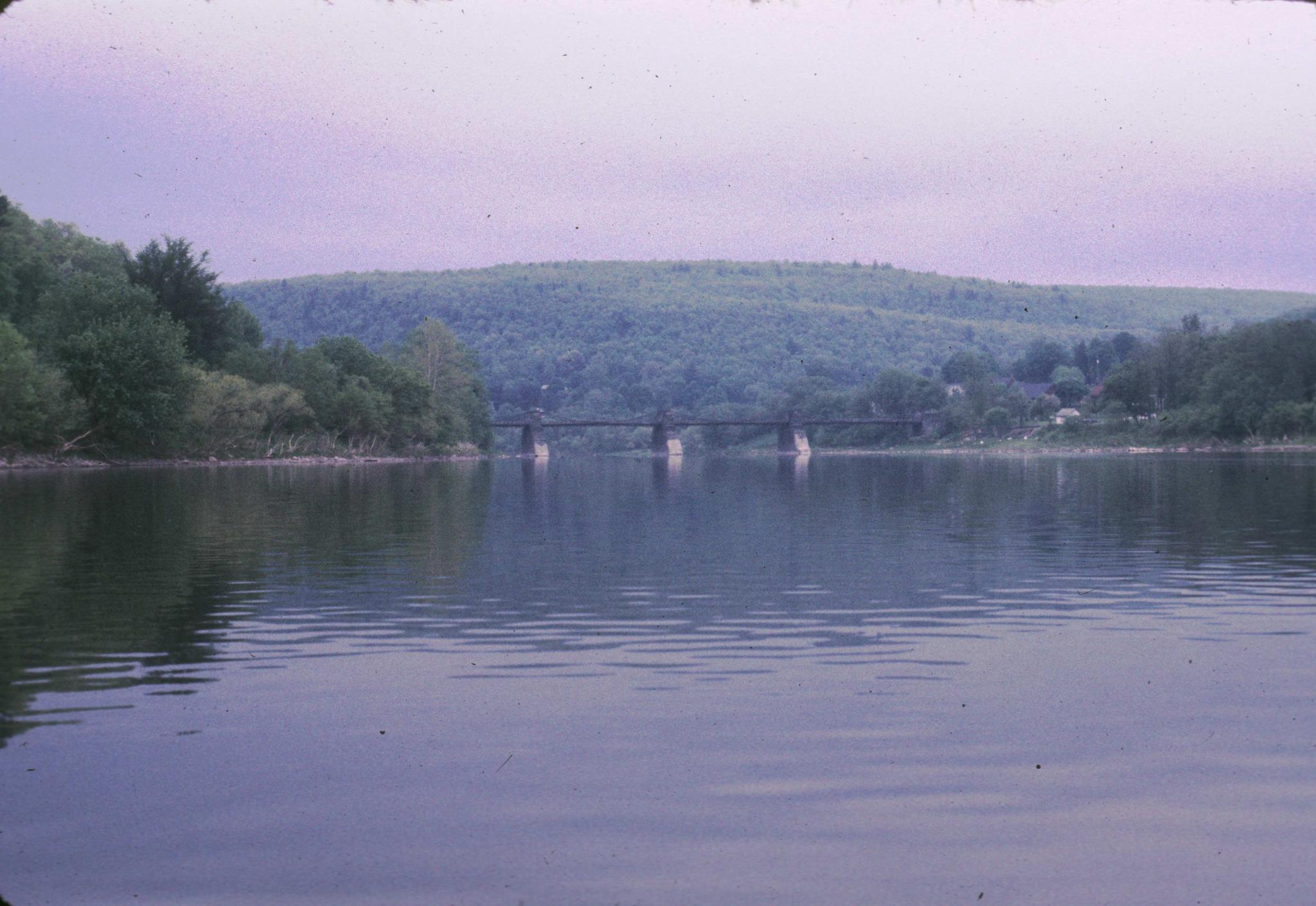 Photograph of Delaware Aqueduct from a rowboat up river.The aqueduct was…