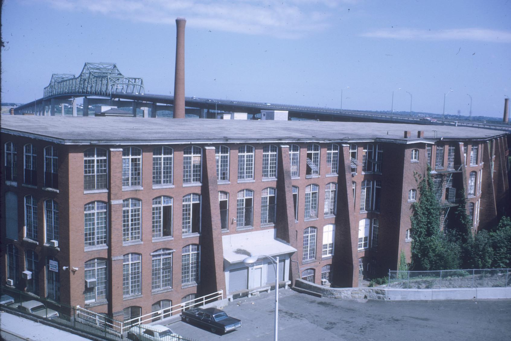 View of American Print Co. Mill No. 7.  Note the flat roof construction and…