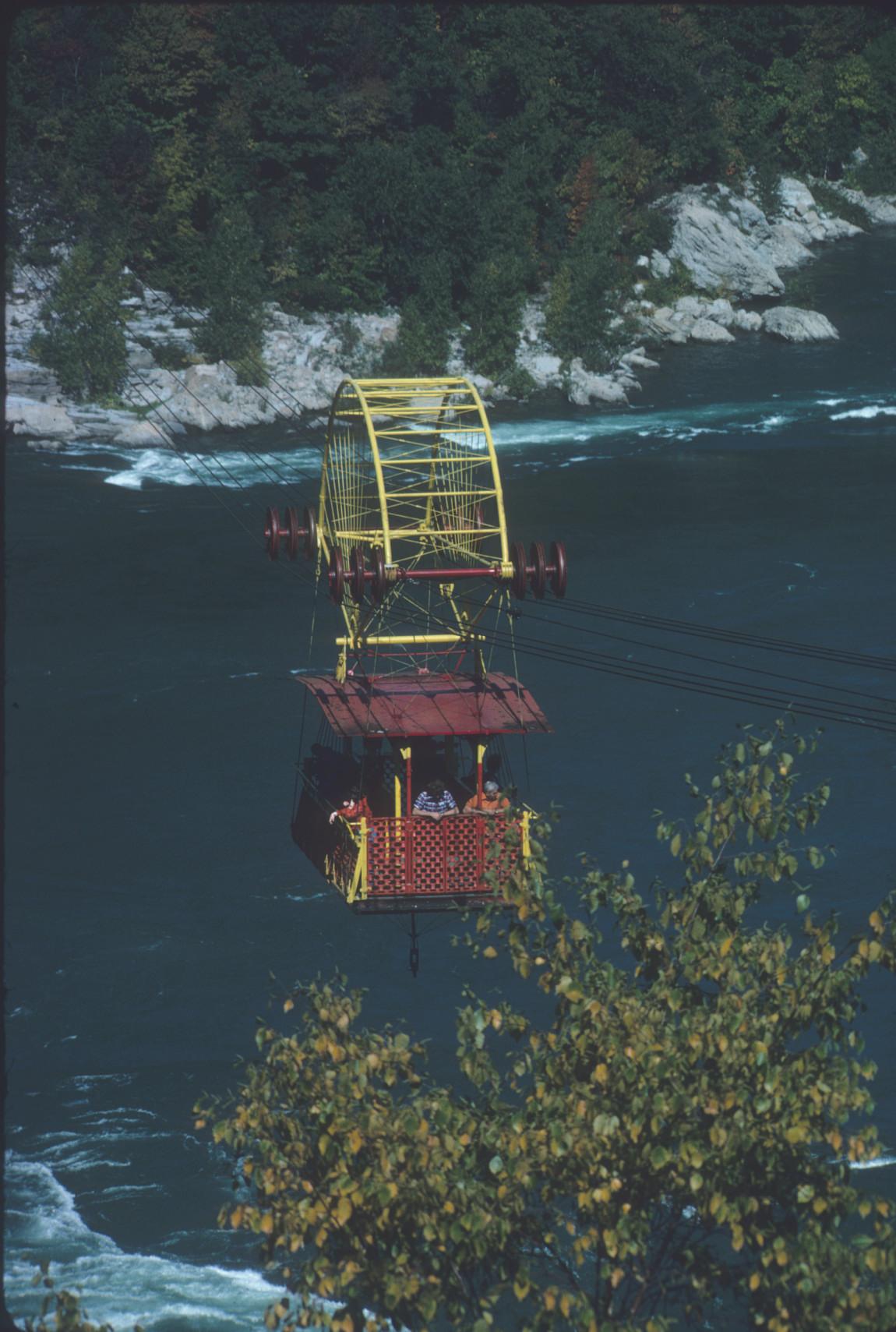 View of aerial gondola in transit, suspended over Niagara Falls Whirlpool