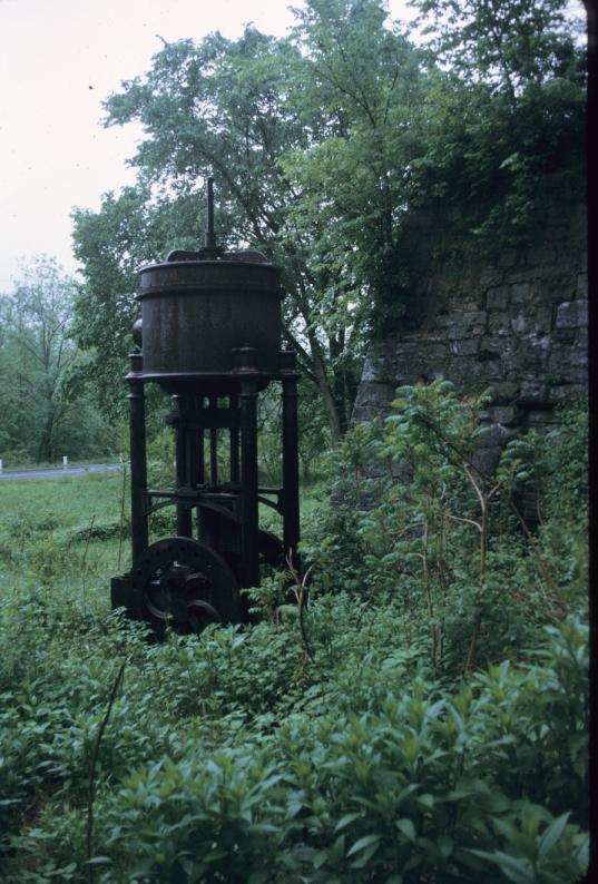 Weimer Bros. blowing engine with stone furnace in background