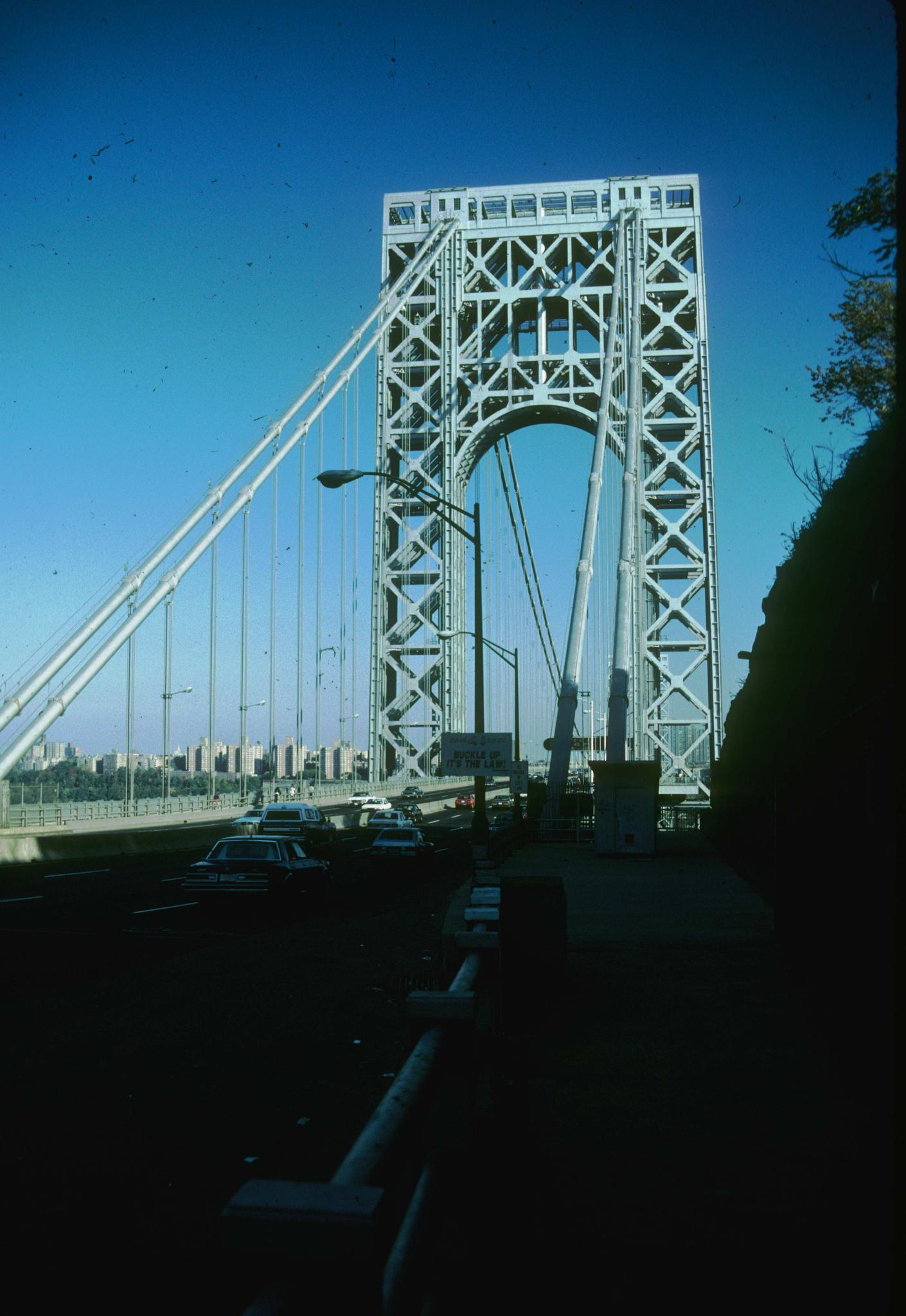 Photograph of entrance of bridge.Which side?