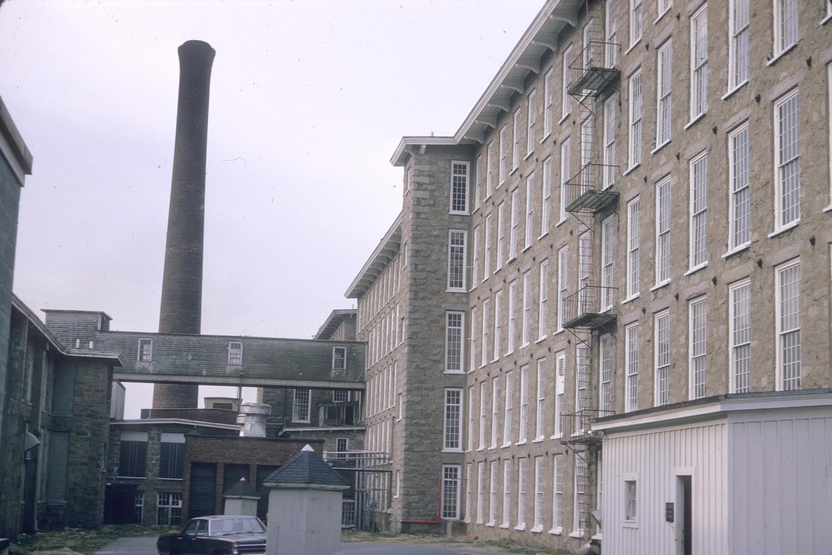 View of the King Philip Mill yard.  Stack clearly visible.  