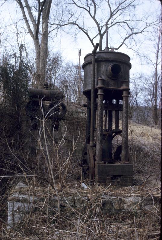 View of blowing engine with boilers in background