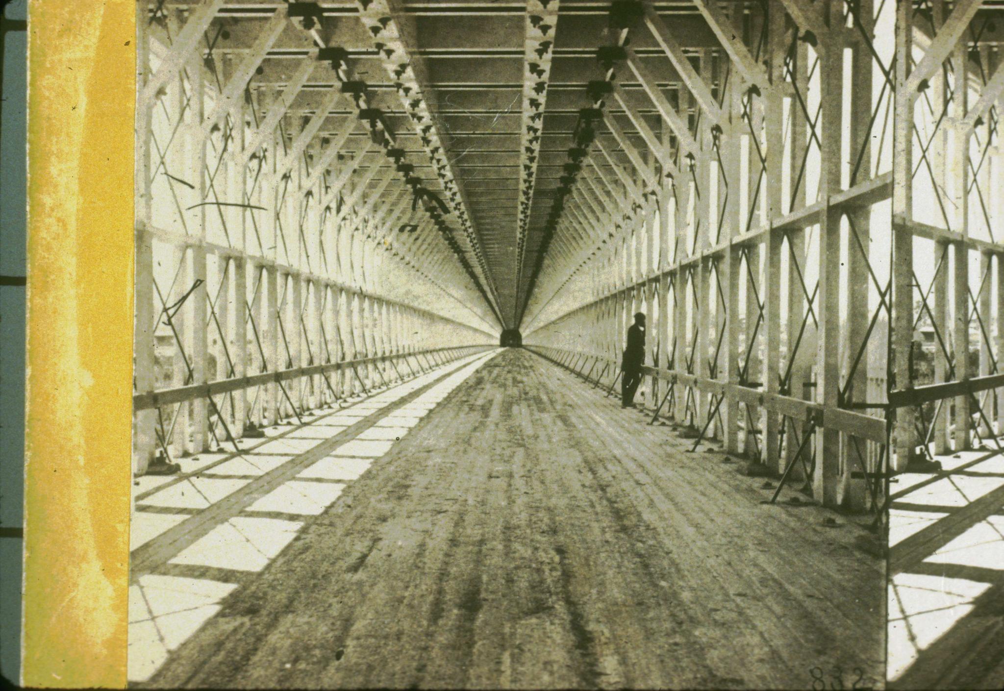 Historic photograph of pedestrian/carriage deck of the Niagara Railroad bridge…