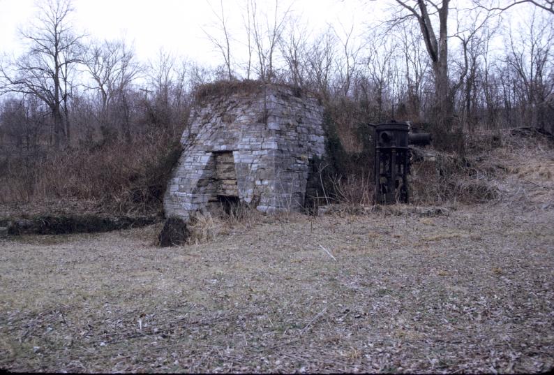 View of furnace area; boilers obscured behind blowing engine