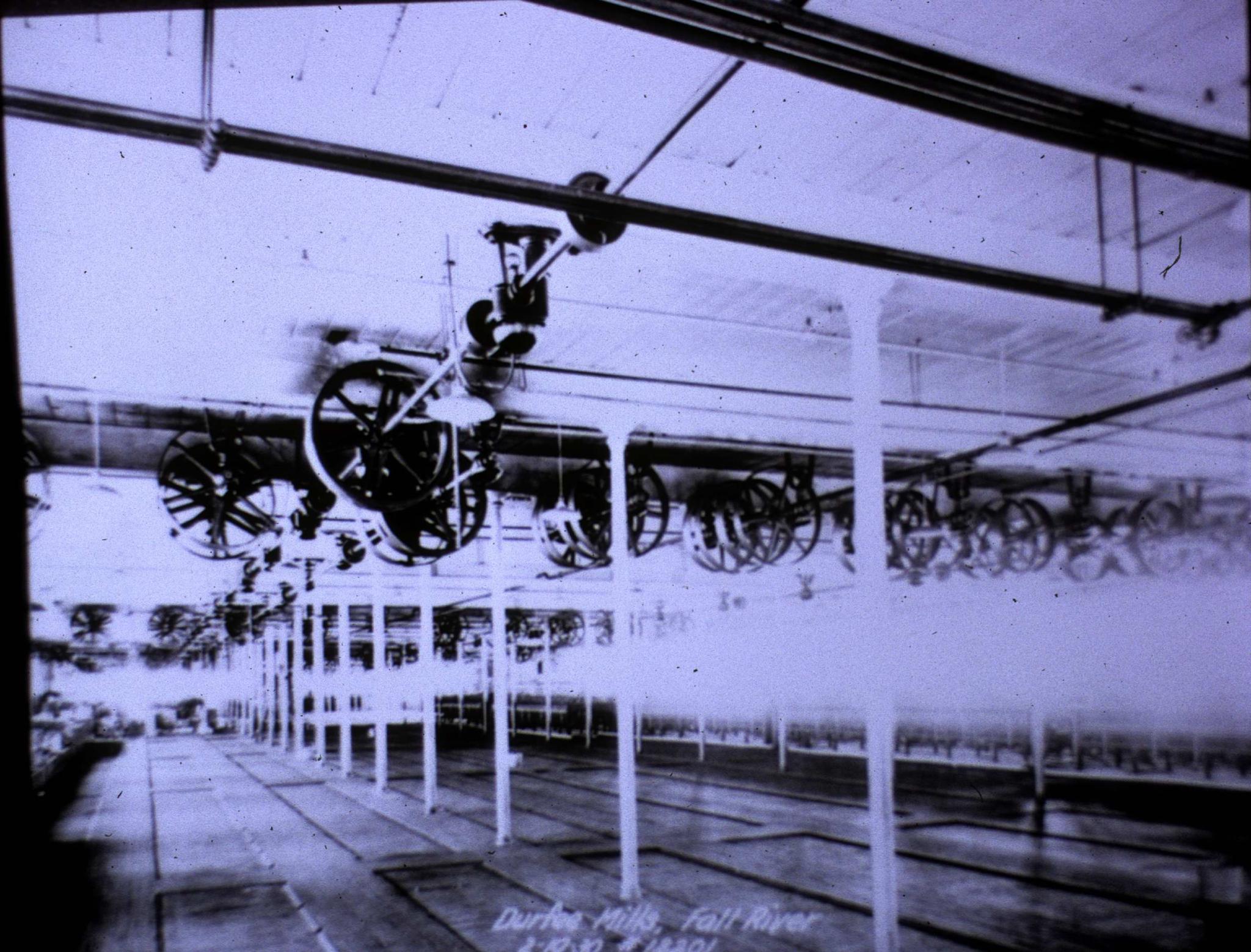 Photo taken in 1930 of the vacated interior of one of the Durfee mills in Fall…