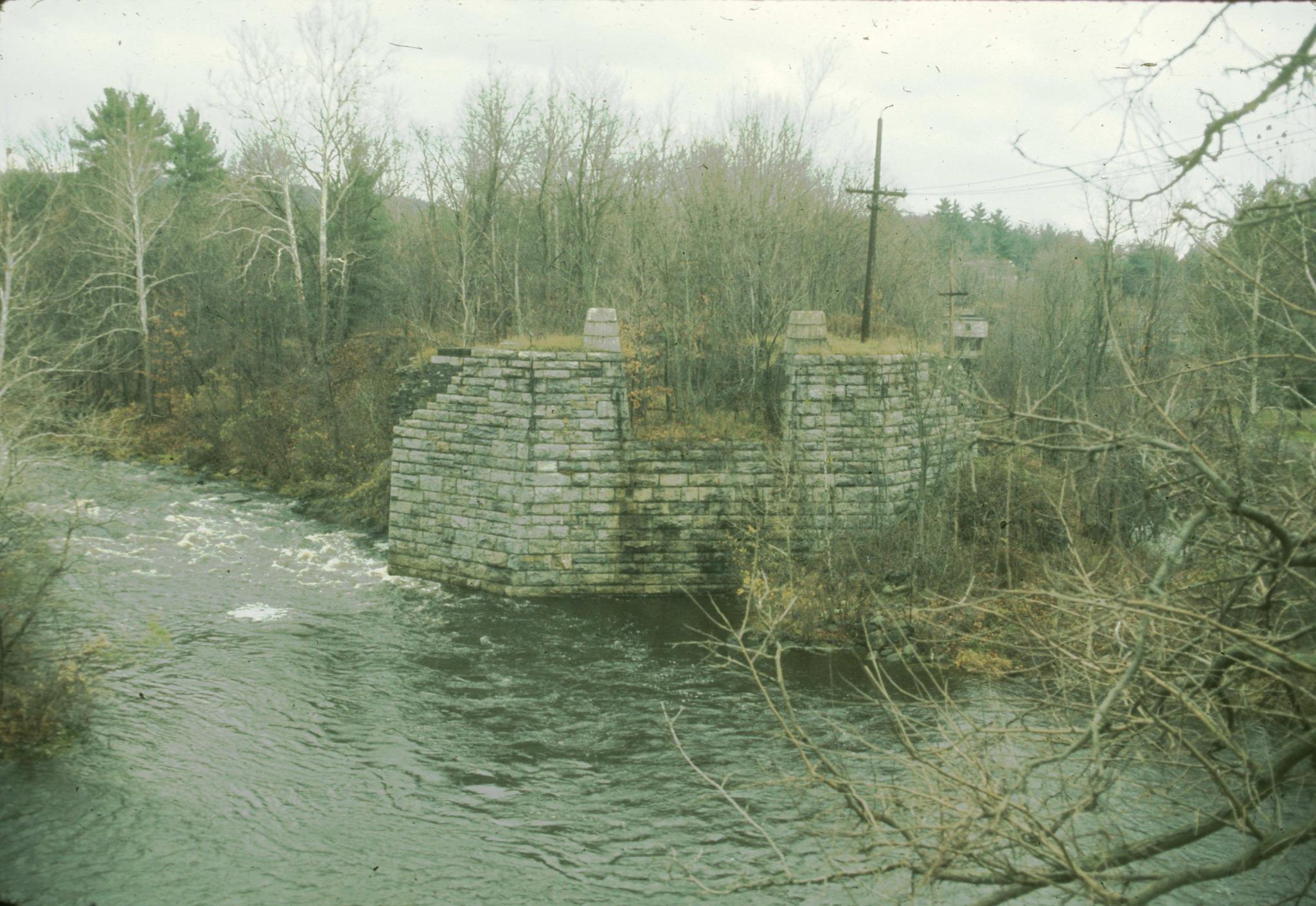 Photograph of bridge abutment of Neversink Aqueduct.The Neversink Aqueduct…