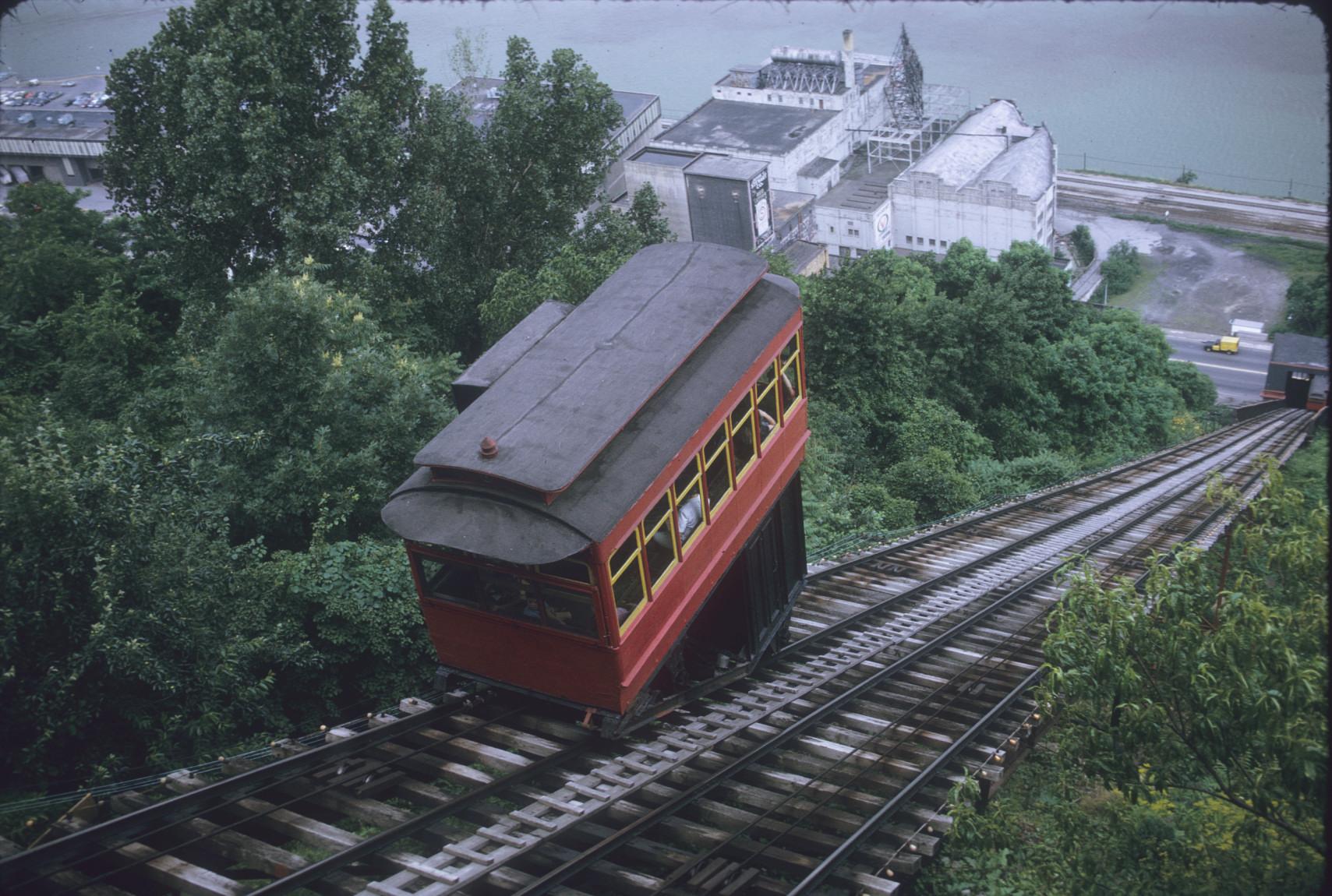 Side view of car on track near Top station