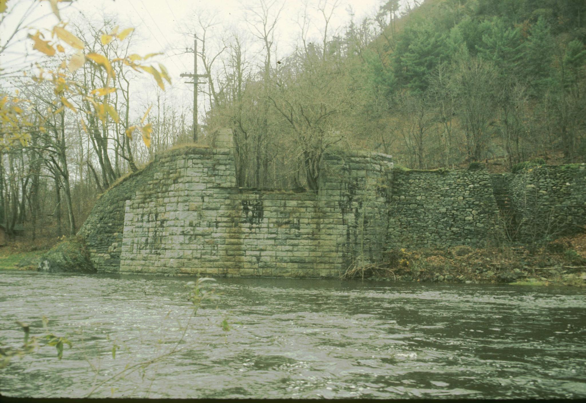 Photograph of an abutment of the Neversink Aqueduct.The Neversink Aqueduct…