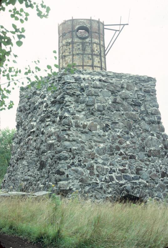 View of restored stone furnace and brick upper structure