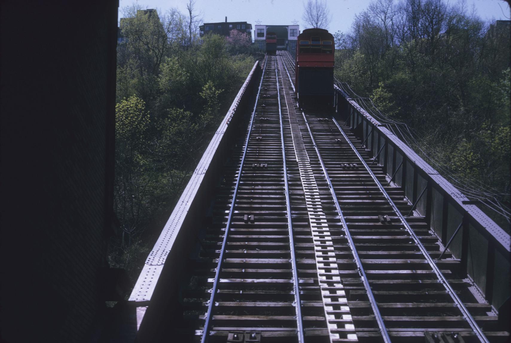 View up slope from inside Bottom station, two cars in transit