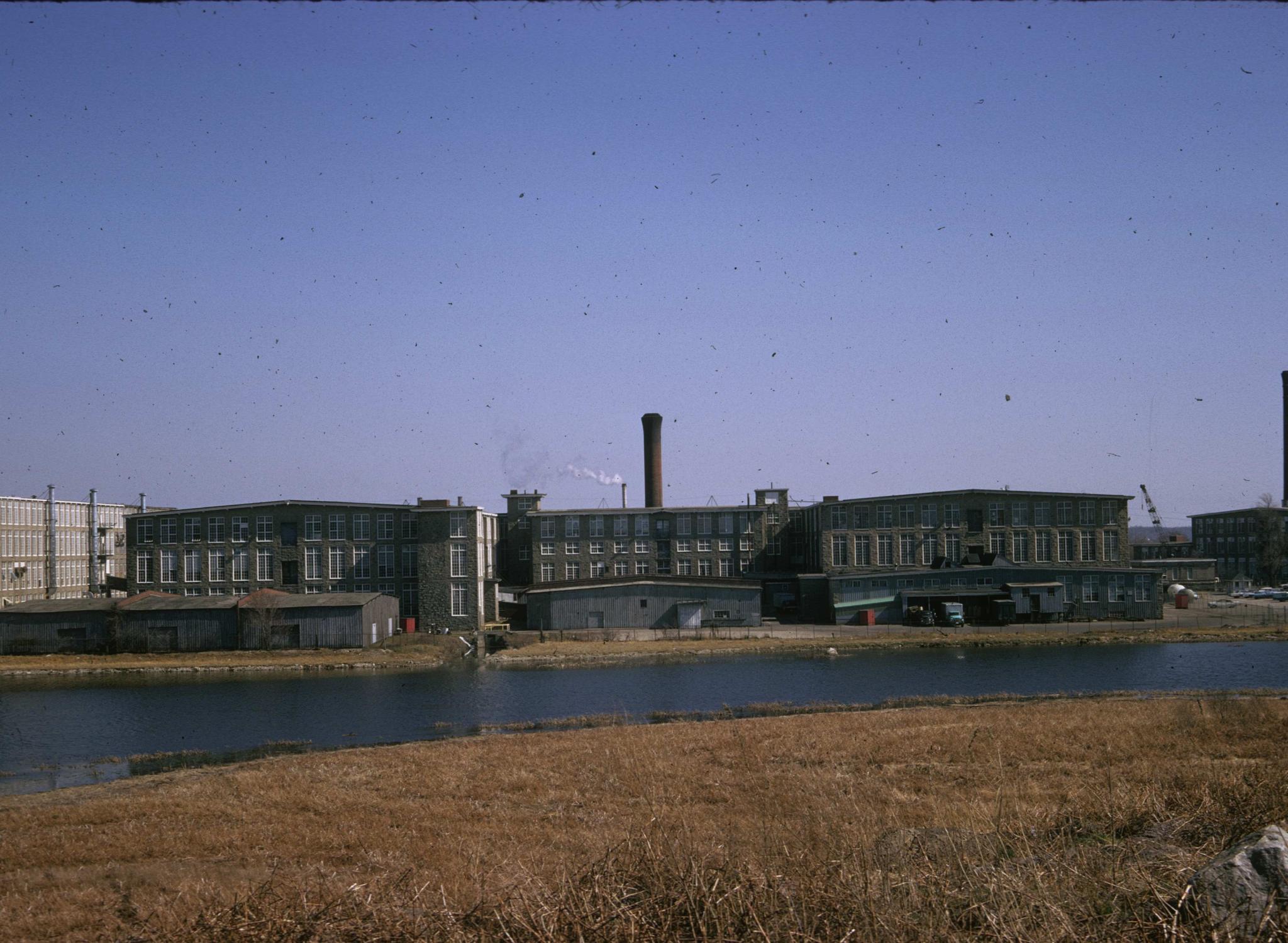 View of the Arkwright and Davis  textile mills from across the Quequechan River.