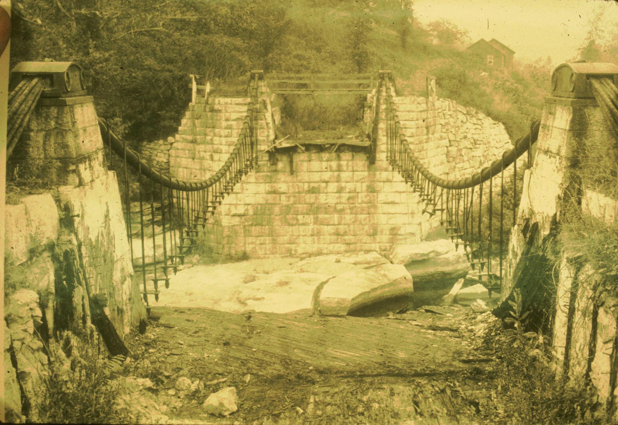 Historic photograph of the High Falls Aqueduct circa 1916.  The deck has…