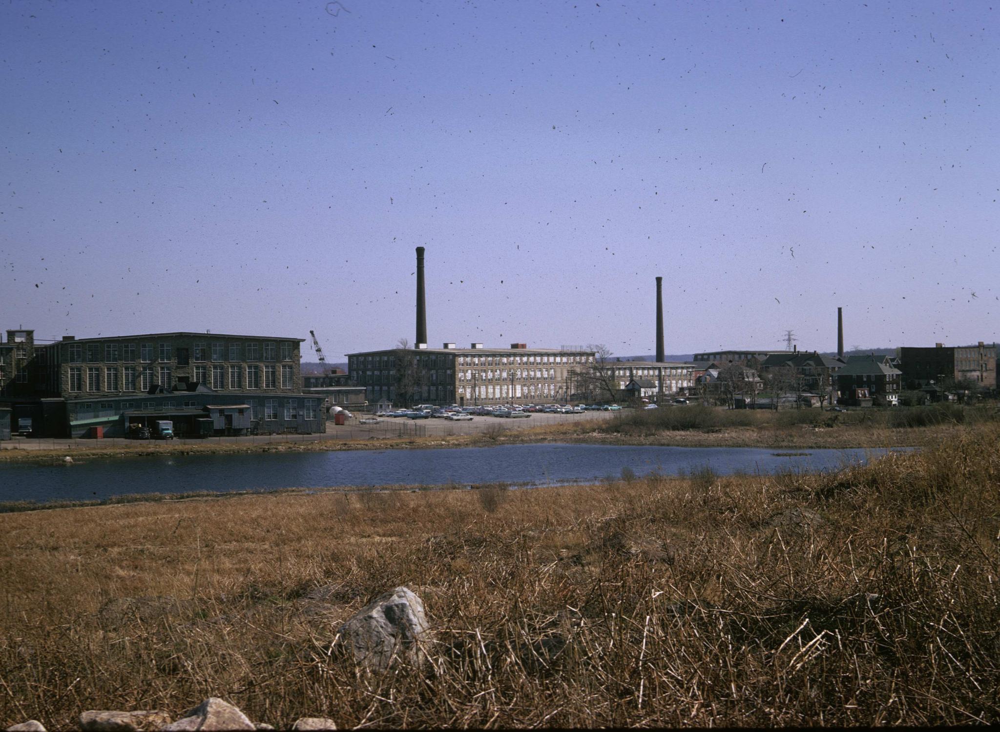 View looking north of the Arkwright and Davis textile mills in Fall River, MA. 