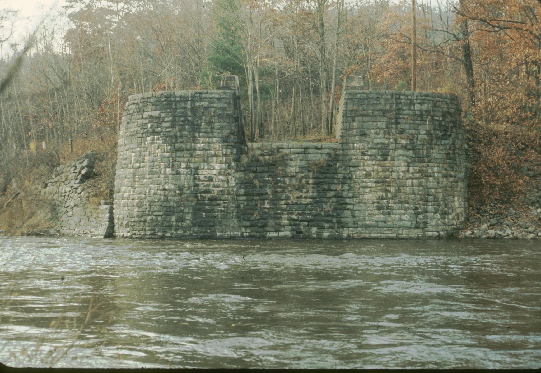 Photograph of the west abutment of the Lackawaxen Aqueduct.  The aqueduct was…