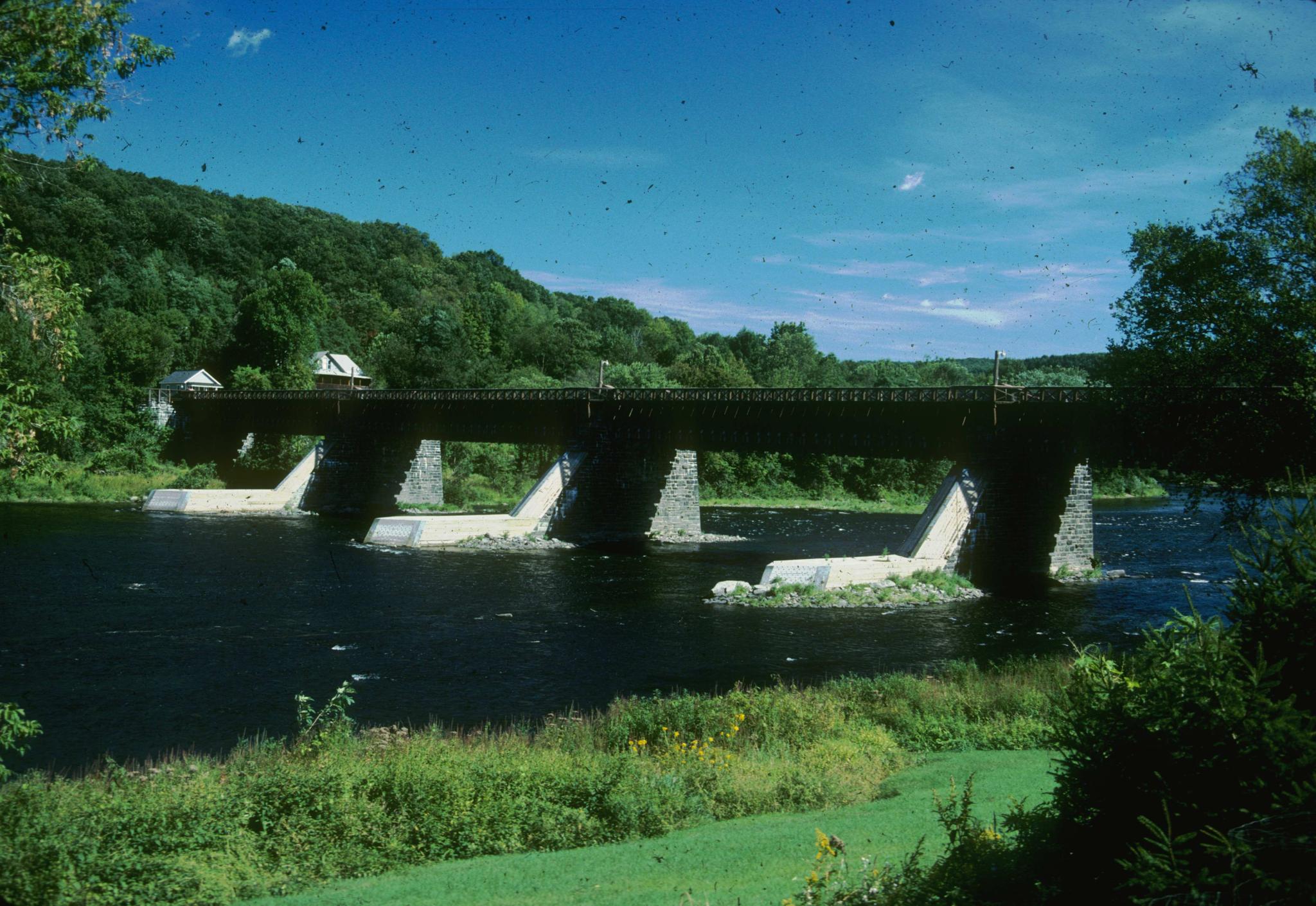 Photograph of the Delaware Aqueduct, also known as the Roebling Bridge. The…