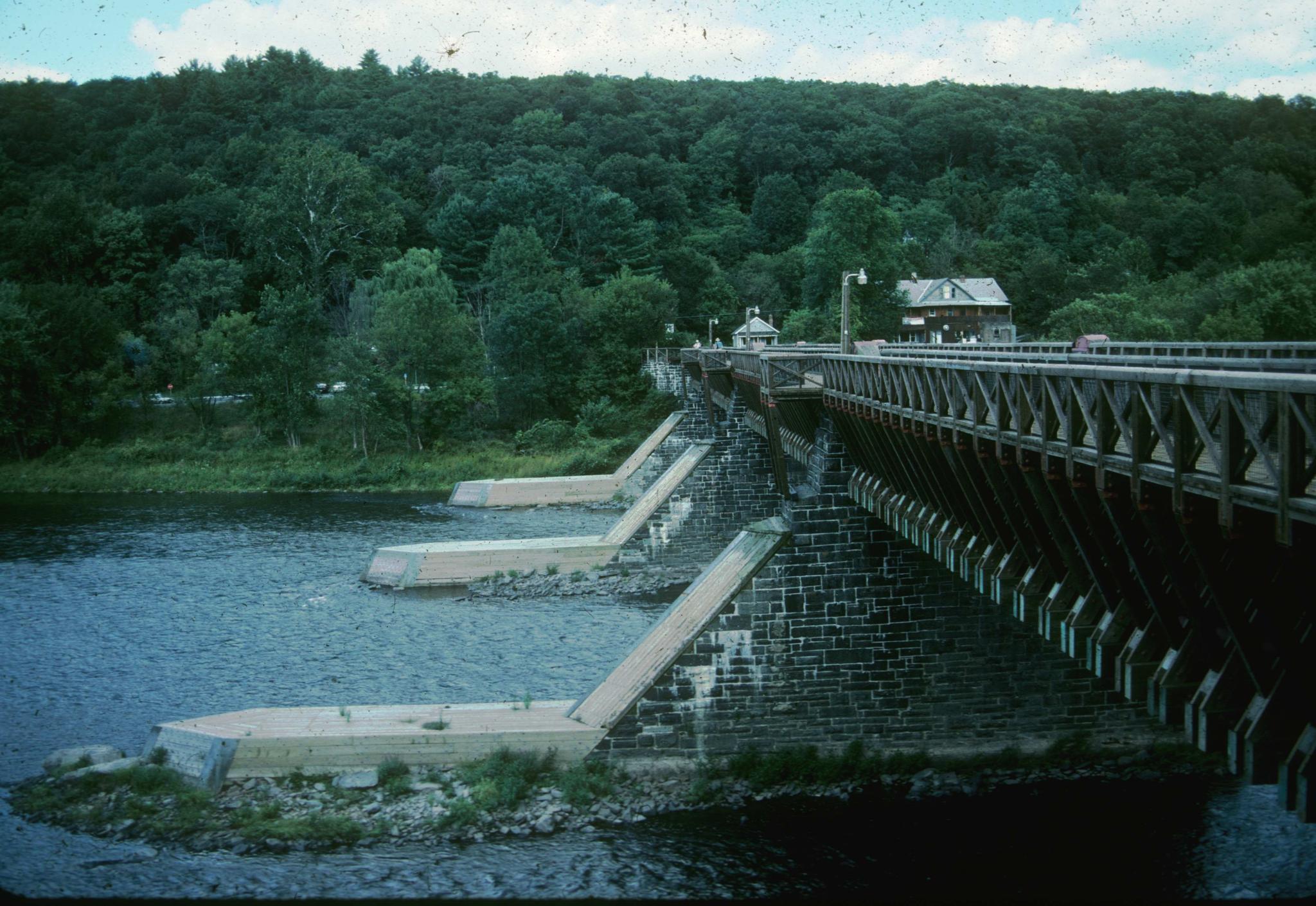 Photograph of the Delaware Aqueduct, also known as the Roebling Bridge. The…