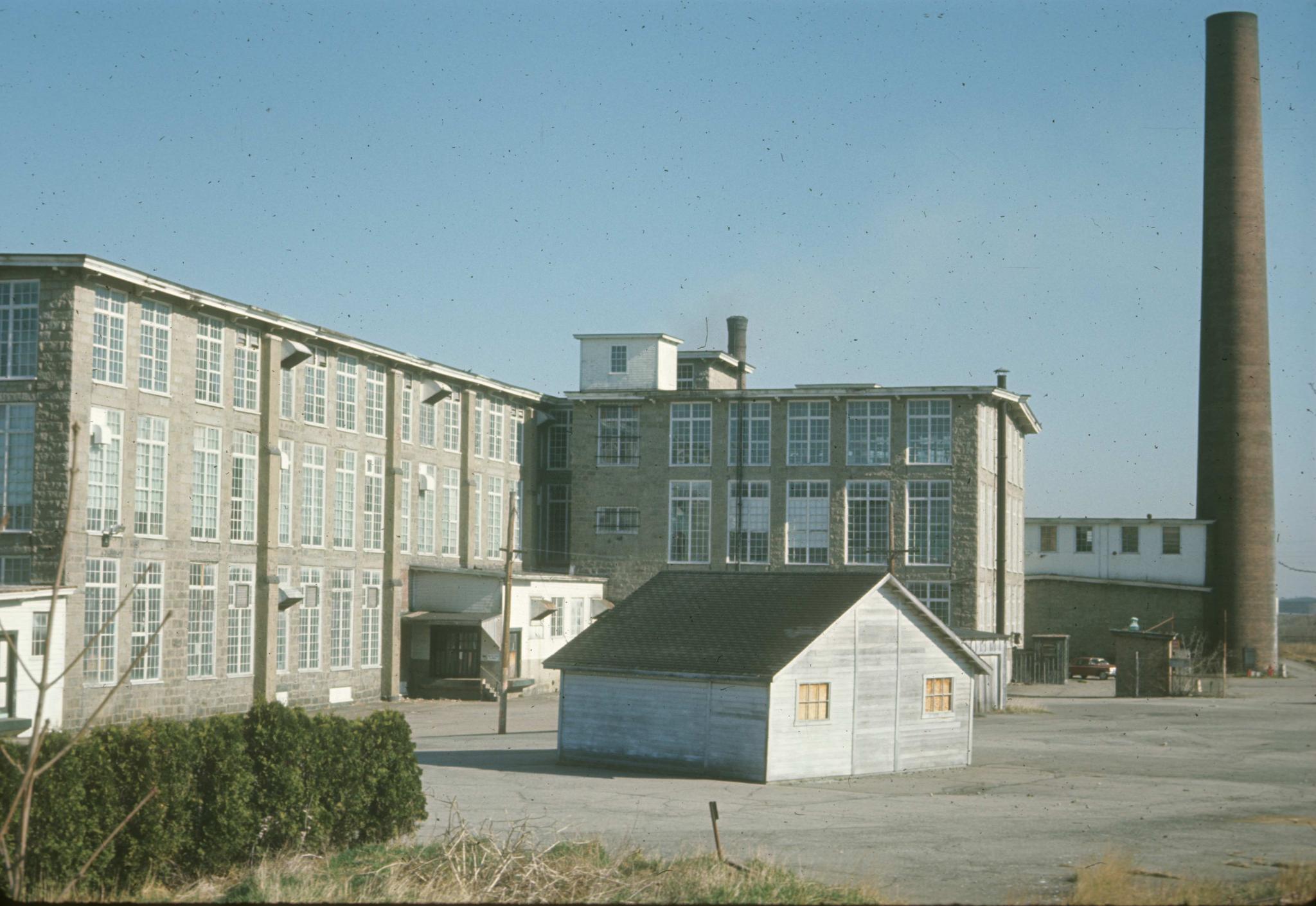 Rear view of Sagamore Mill No. 2 and stack. 