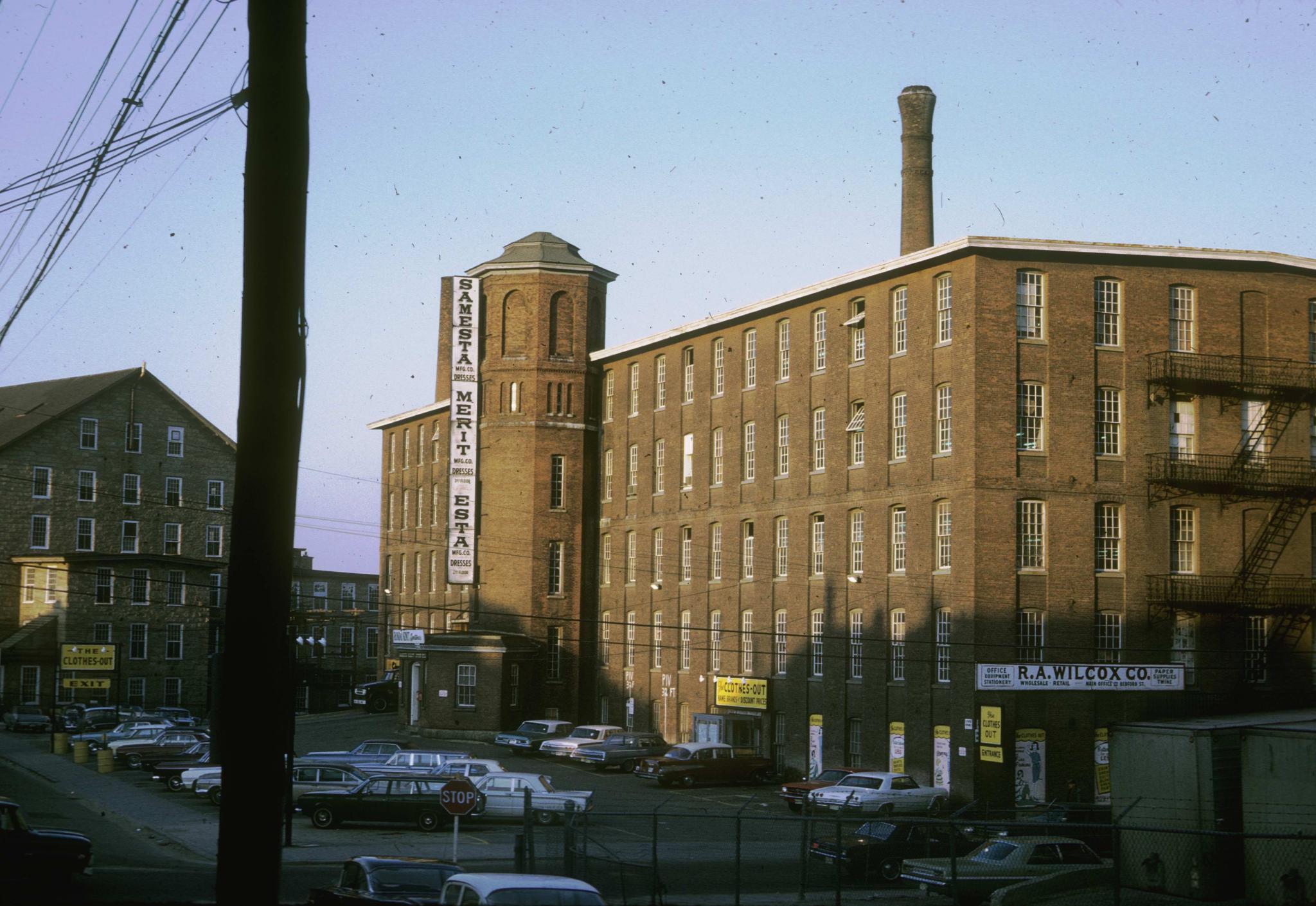 Photograph of the Robeson Mill showing octagonal tower and cast-iron fire-…