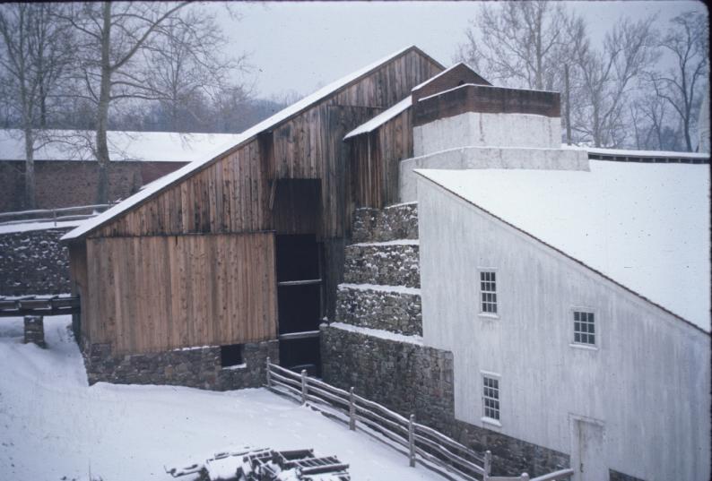 General view of enclosed charging floor, furnace, and casting shed 