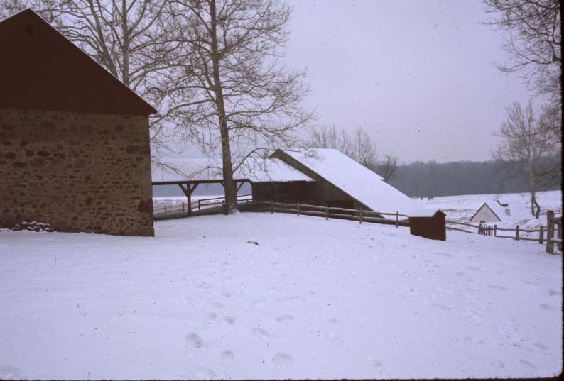 View of covered passage from charcoal shed to enclosed furnace charging deck