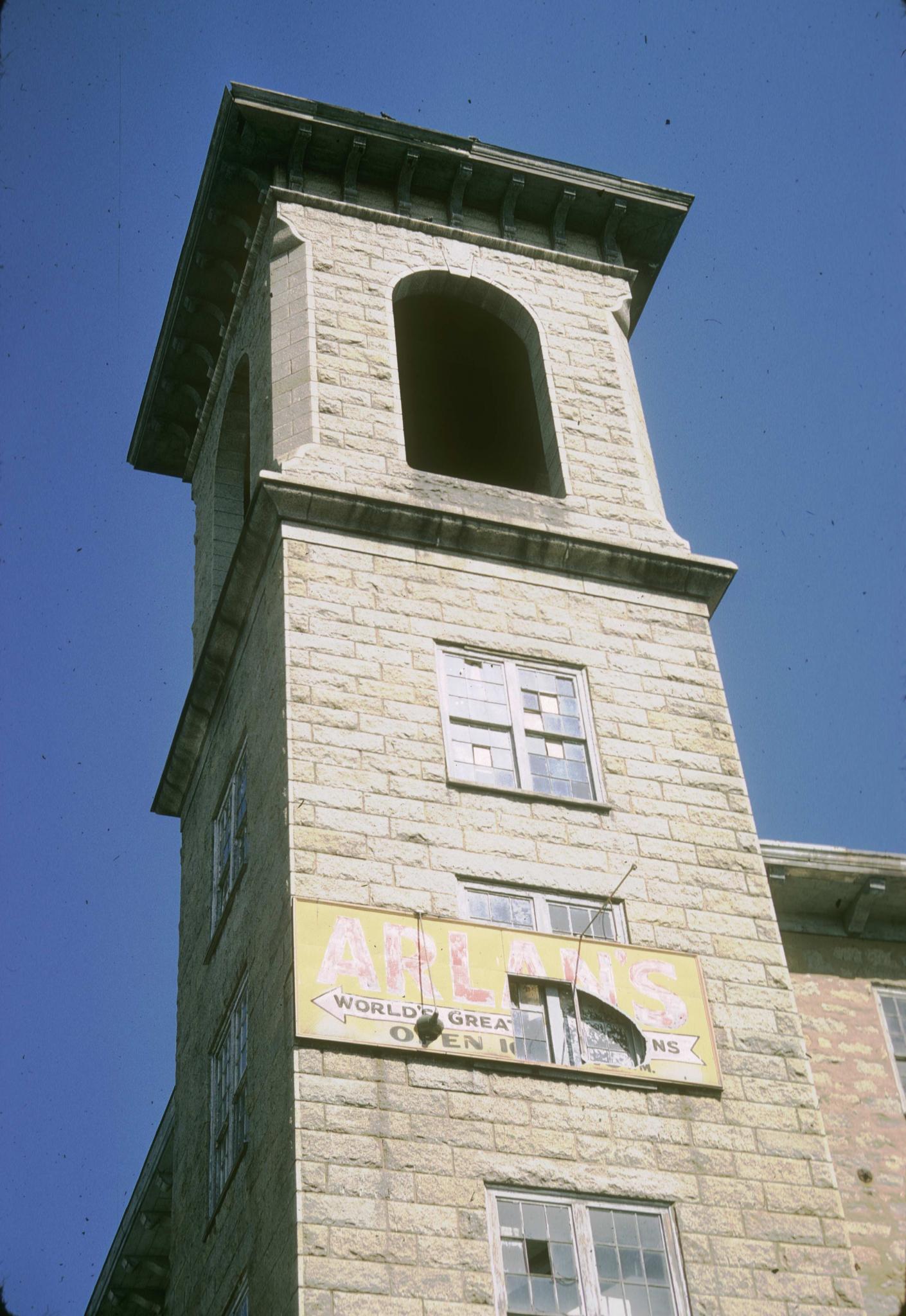 Photograph showing details of a tower of the mill.