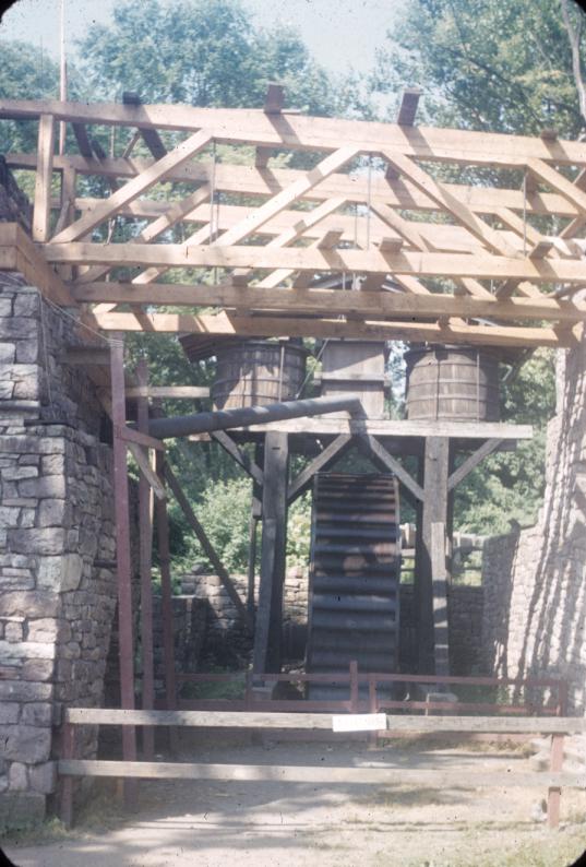 View of breast wheel and blowing engine looking through below charging deck…