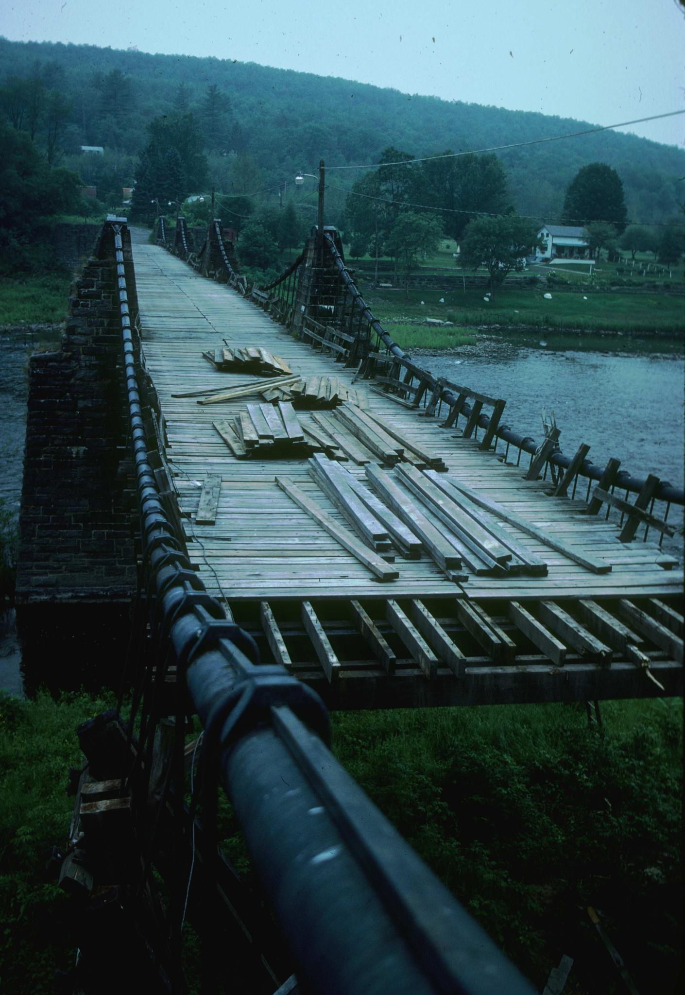 Photograph of work on the deck of the Delaware (Roebling) aqueduct showing its…