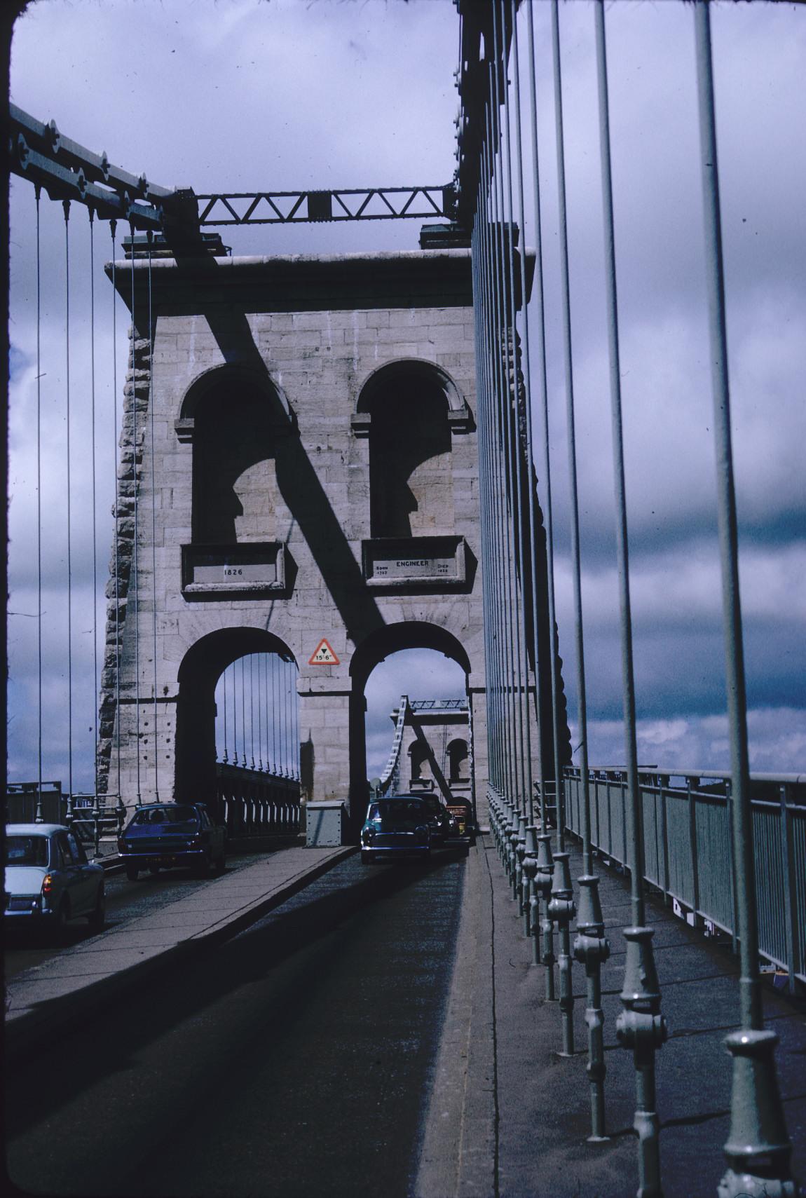 View through tower along roadway; deck suspension details.