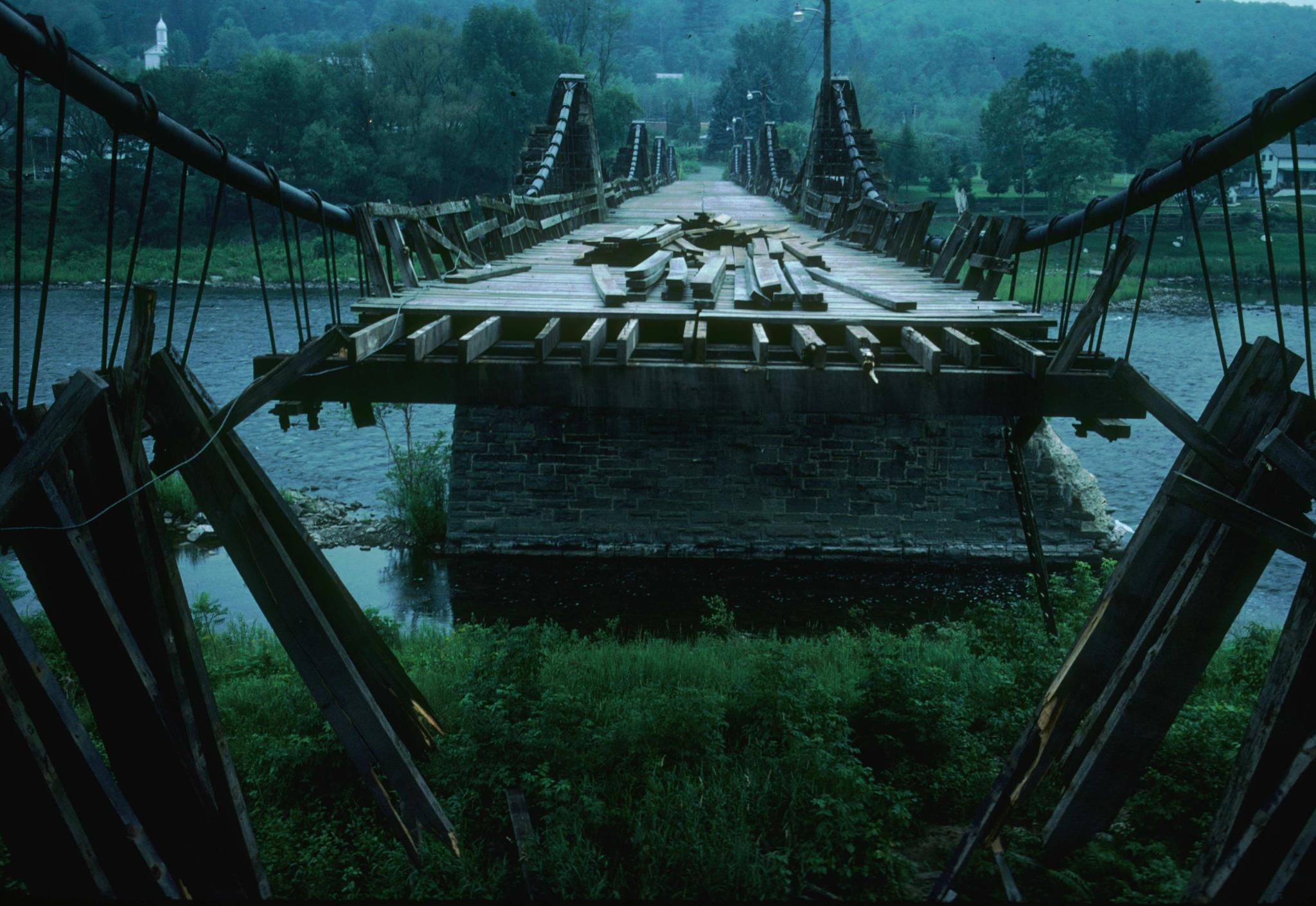 Photograph of damage to the Delaware (Roebling) Aqueduct showing the cross-…