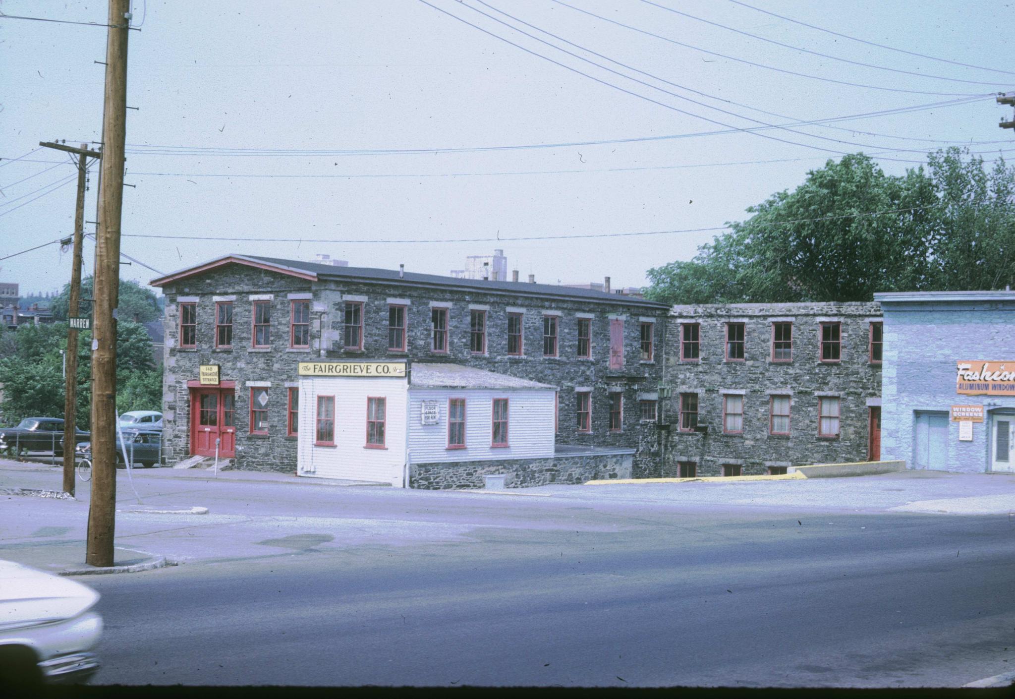 Unidentified textile mill on the Concord River at Lowell, Massachusetts.  