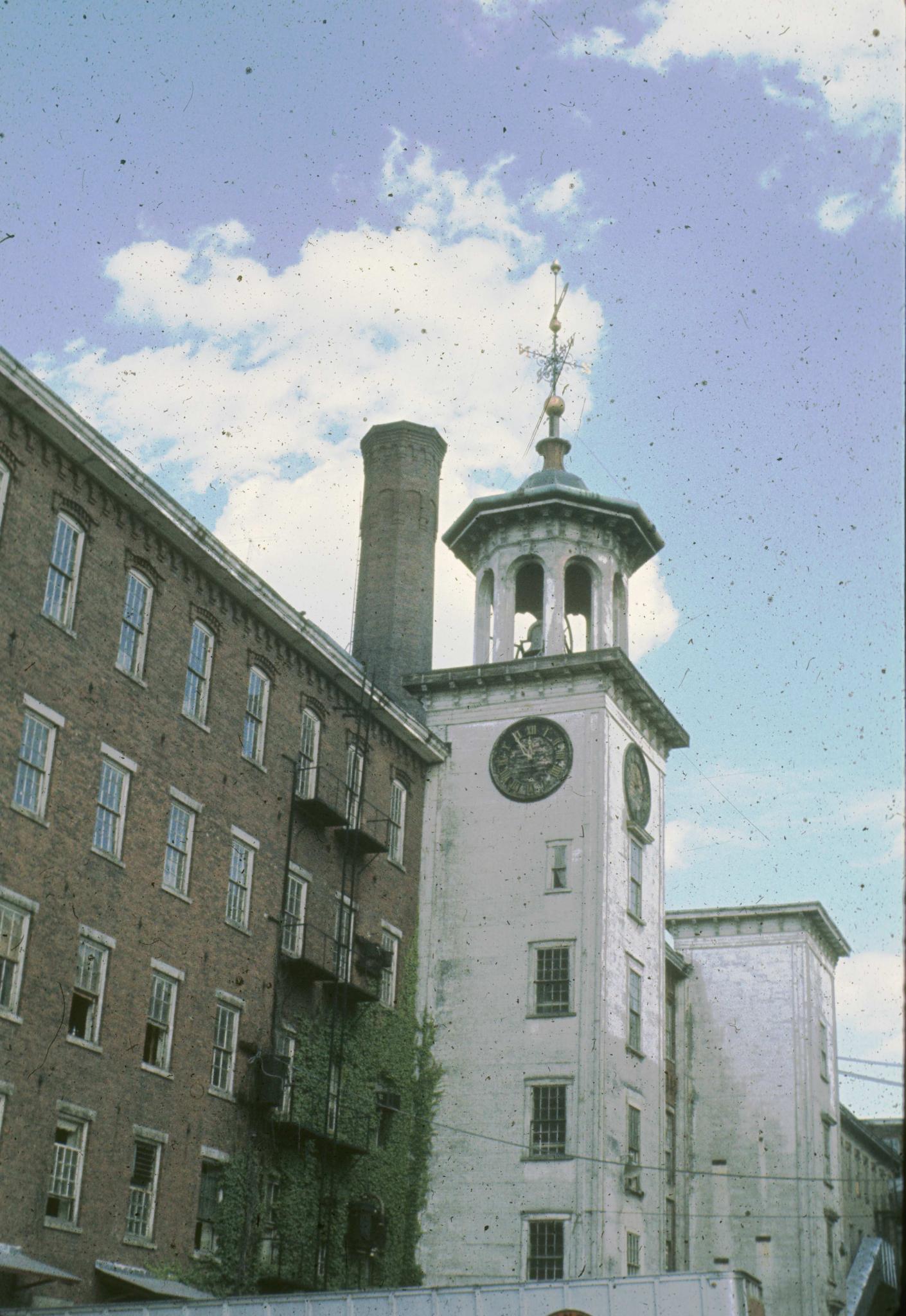 Photograph of Boott Mill taken from the foot of John Street focusing on the…