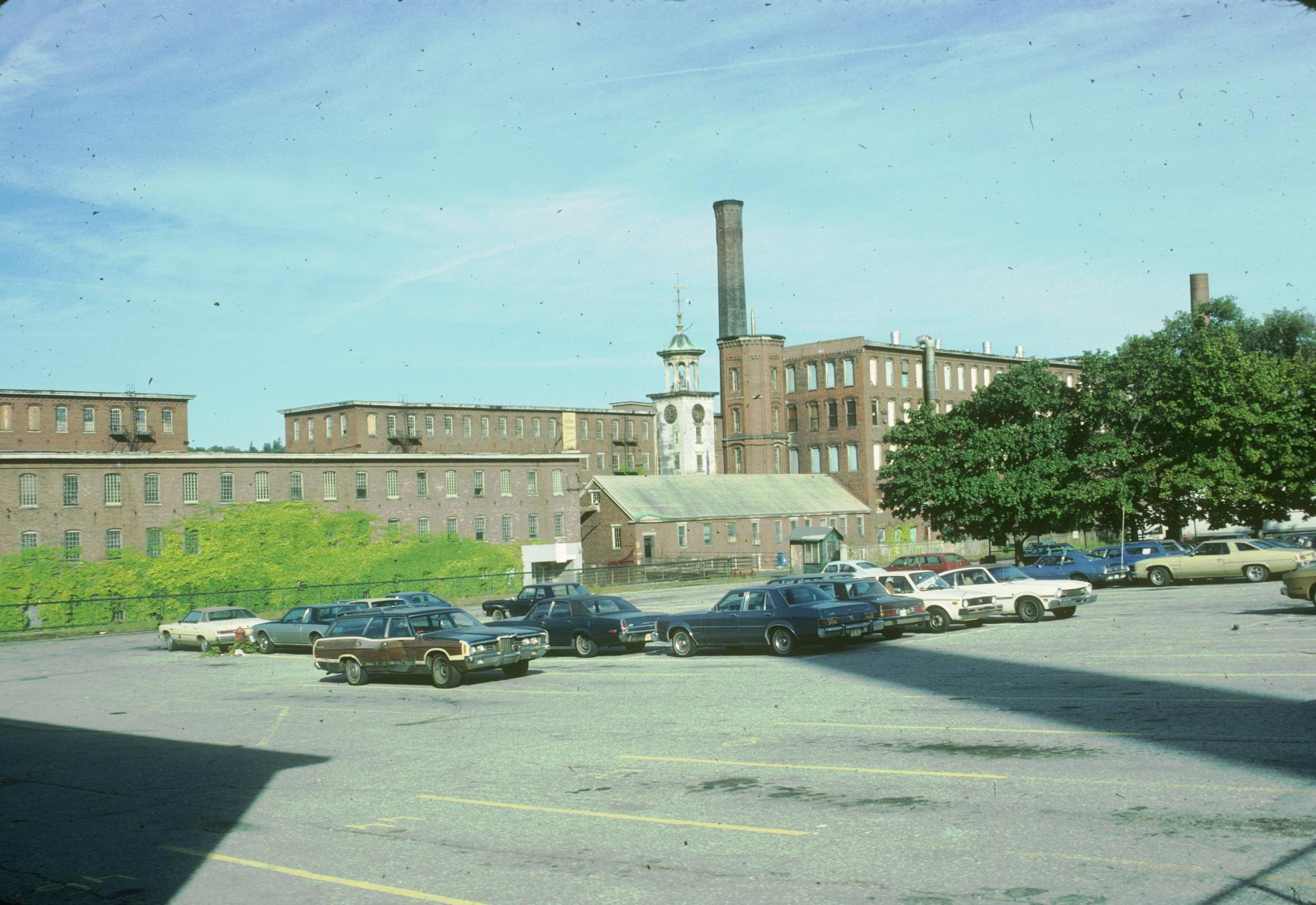 Photograph of the mill taken from a parking lot.