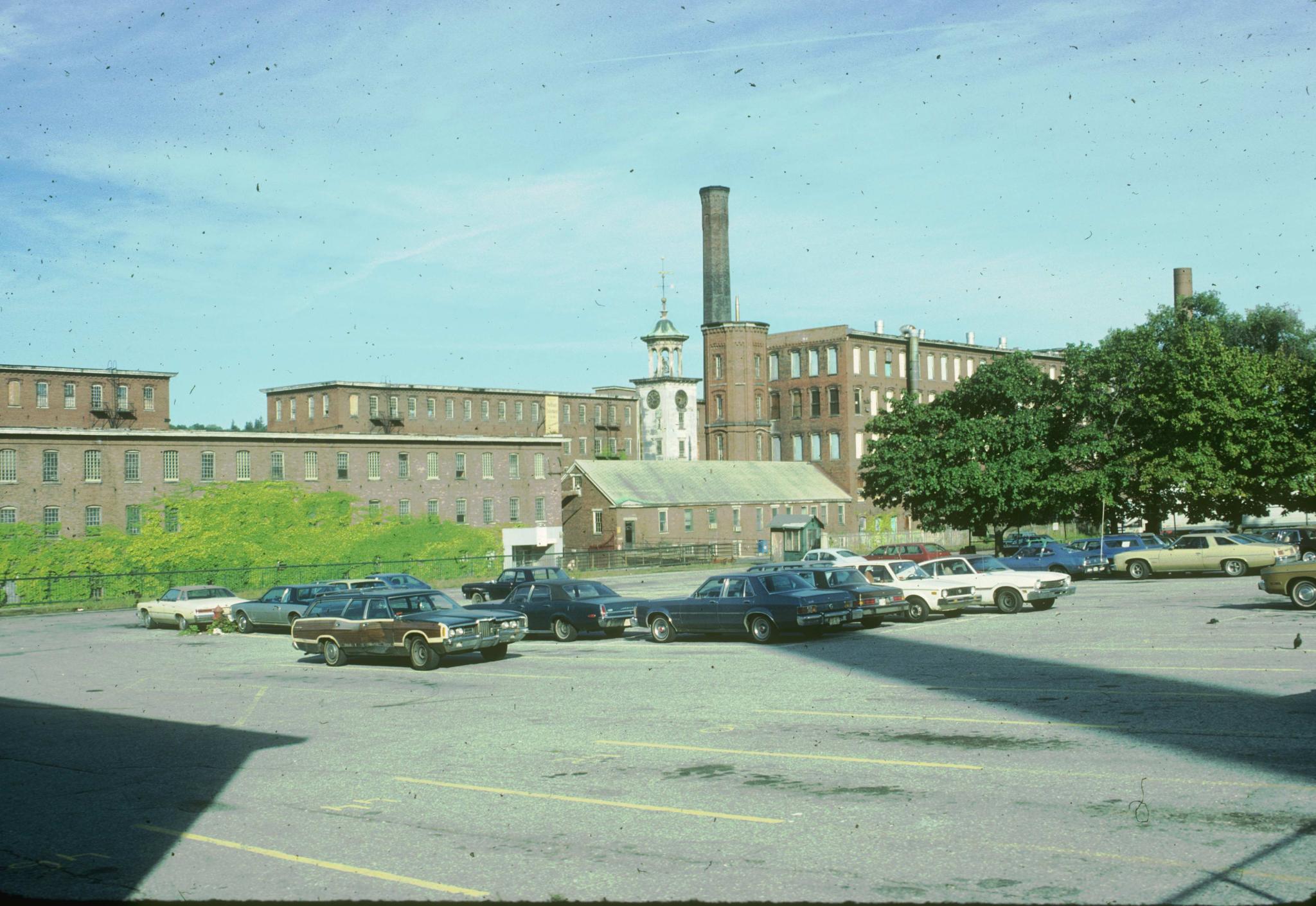 Photograph of the mill taken from a parking lot.