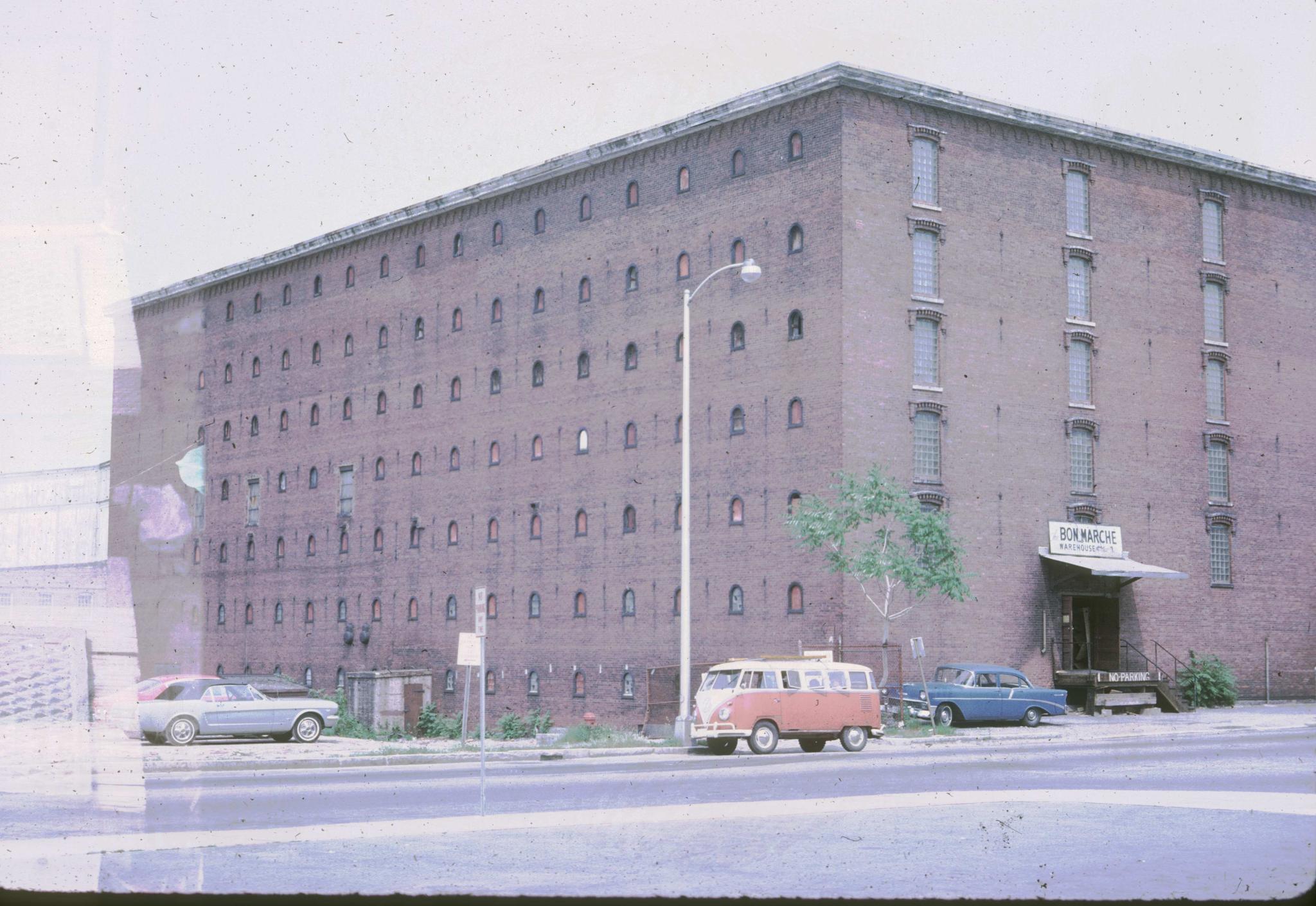 Photograph of a large warehouse for the Boott Mill.