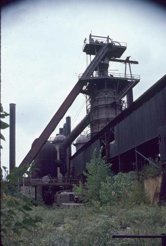 View of furnace with stove system in background