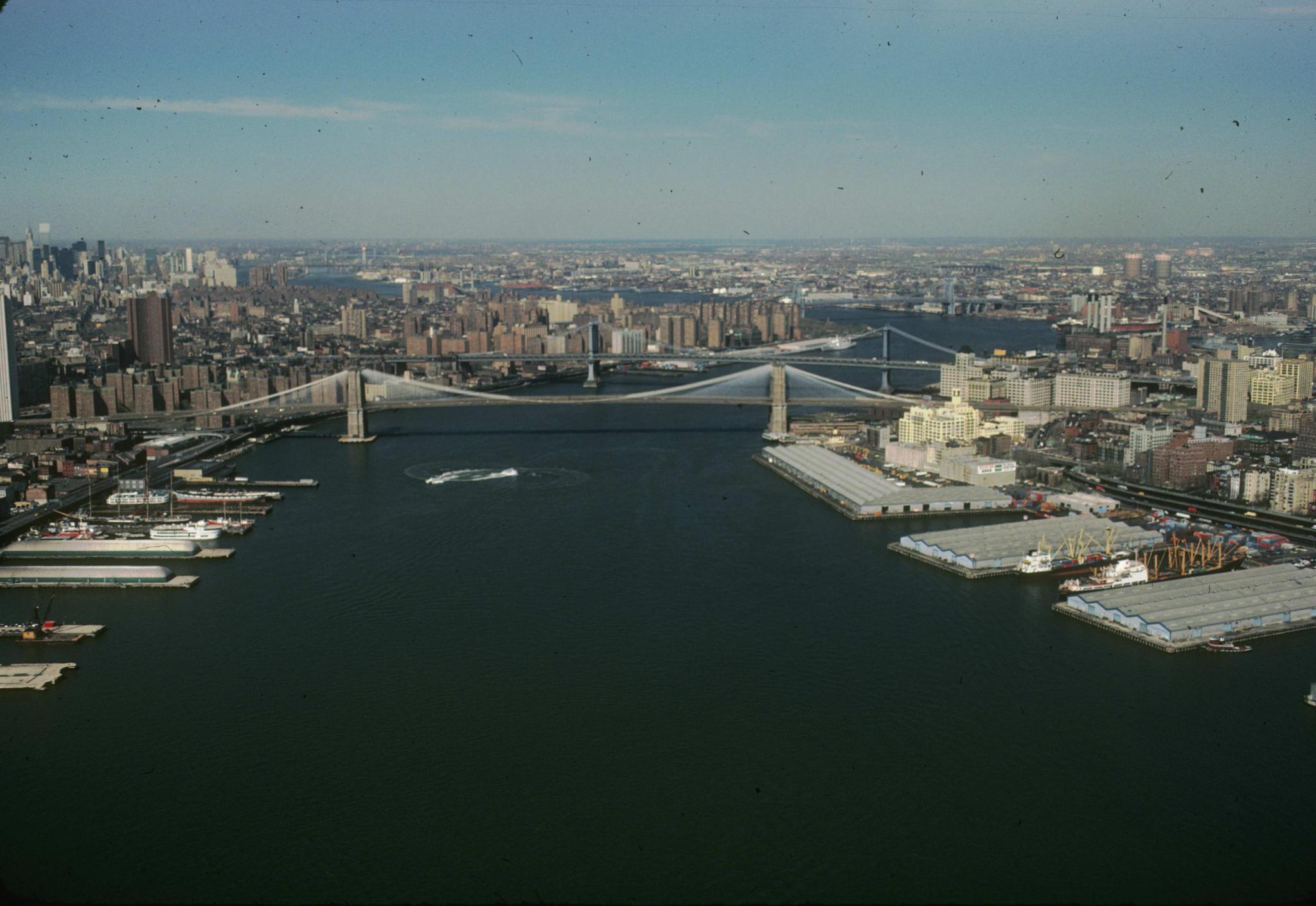 Aerial photograph of the Brooklyn Bridge showing good views of New York City.…